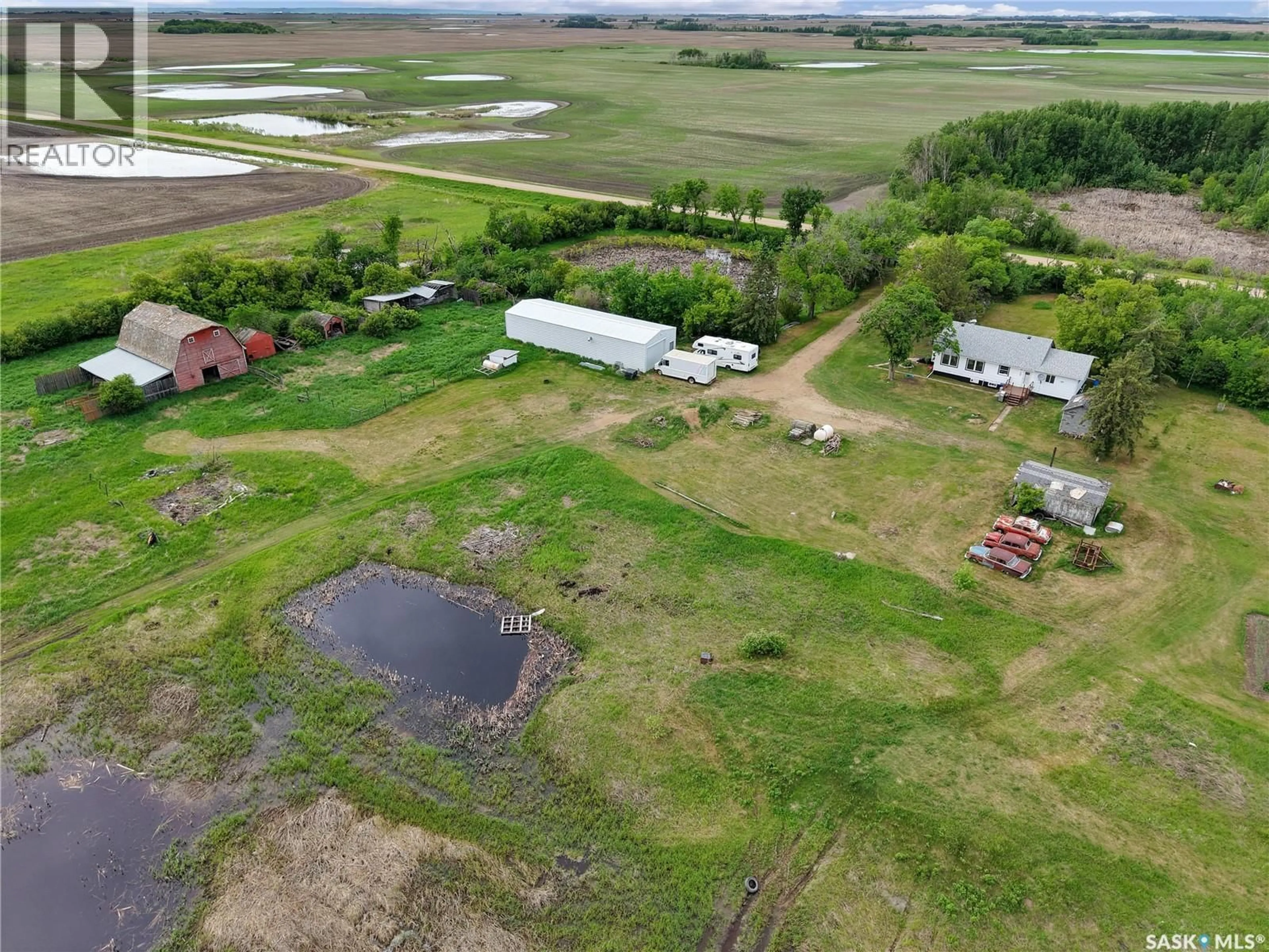 A pic from outside/outdoor area/front of a property/back of a property/a pic from drone, mountain view for BARAN ACREAGE, Blaine Lake Rm No. 434 Saskatchewan S0J0J0