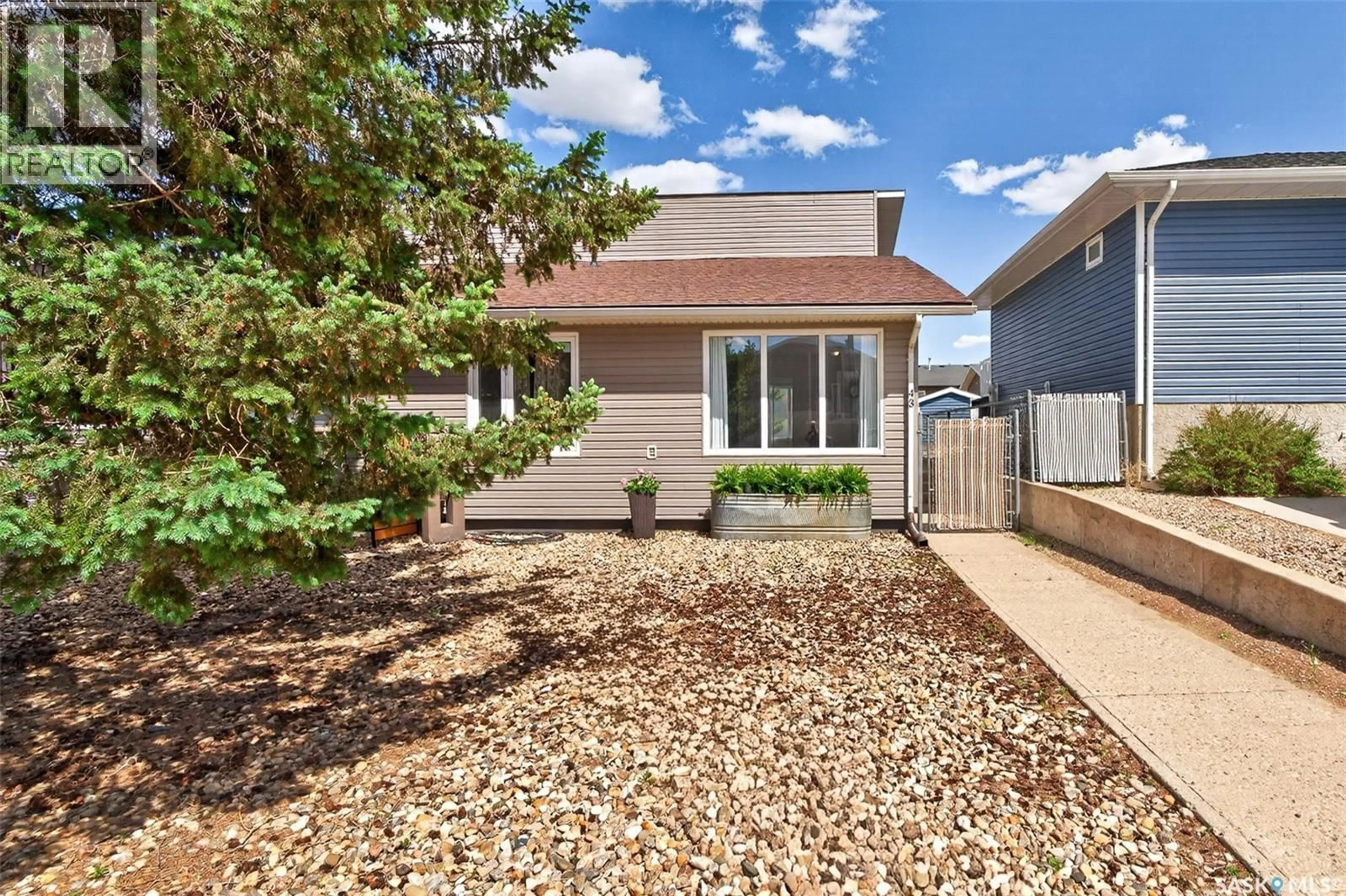 Home with vinyl exterior material, street for 43 ARLINGTON AVENUE, Moose Jaw Saskatchewan S6K1B2