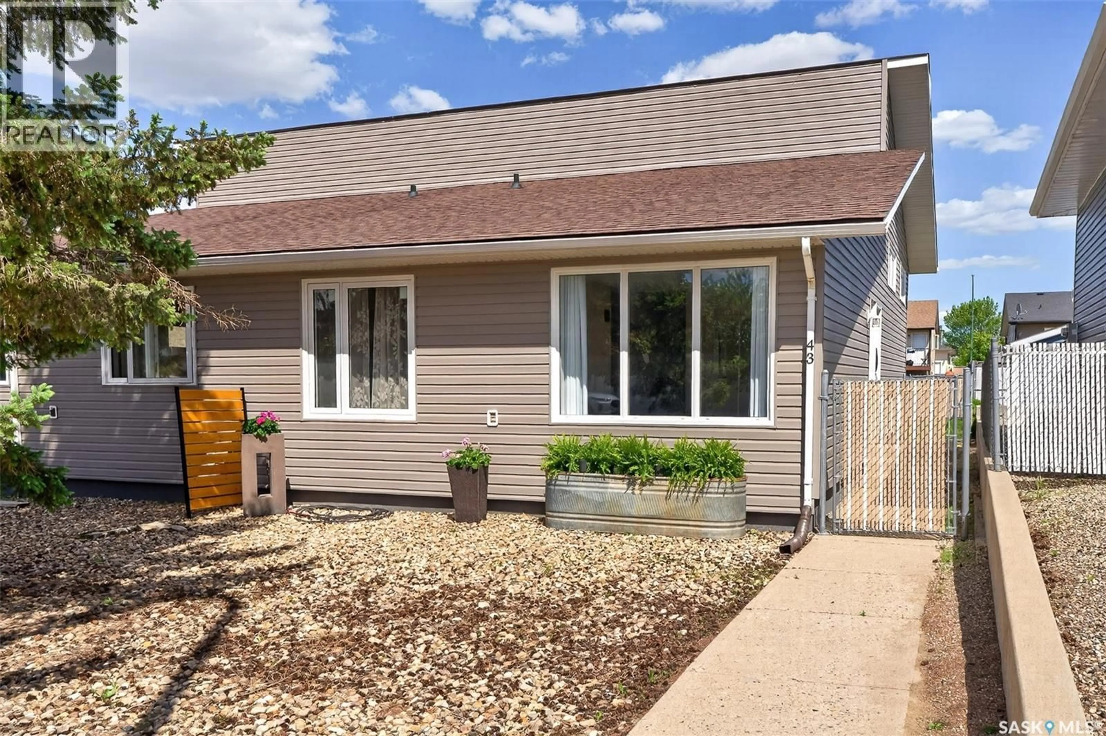 Home with vinyl exterior material, street for 43 ARLINGTON AVENUE, Moose Jaw Saskatchewan S6K1B2