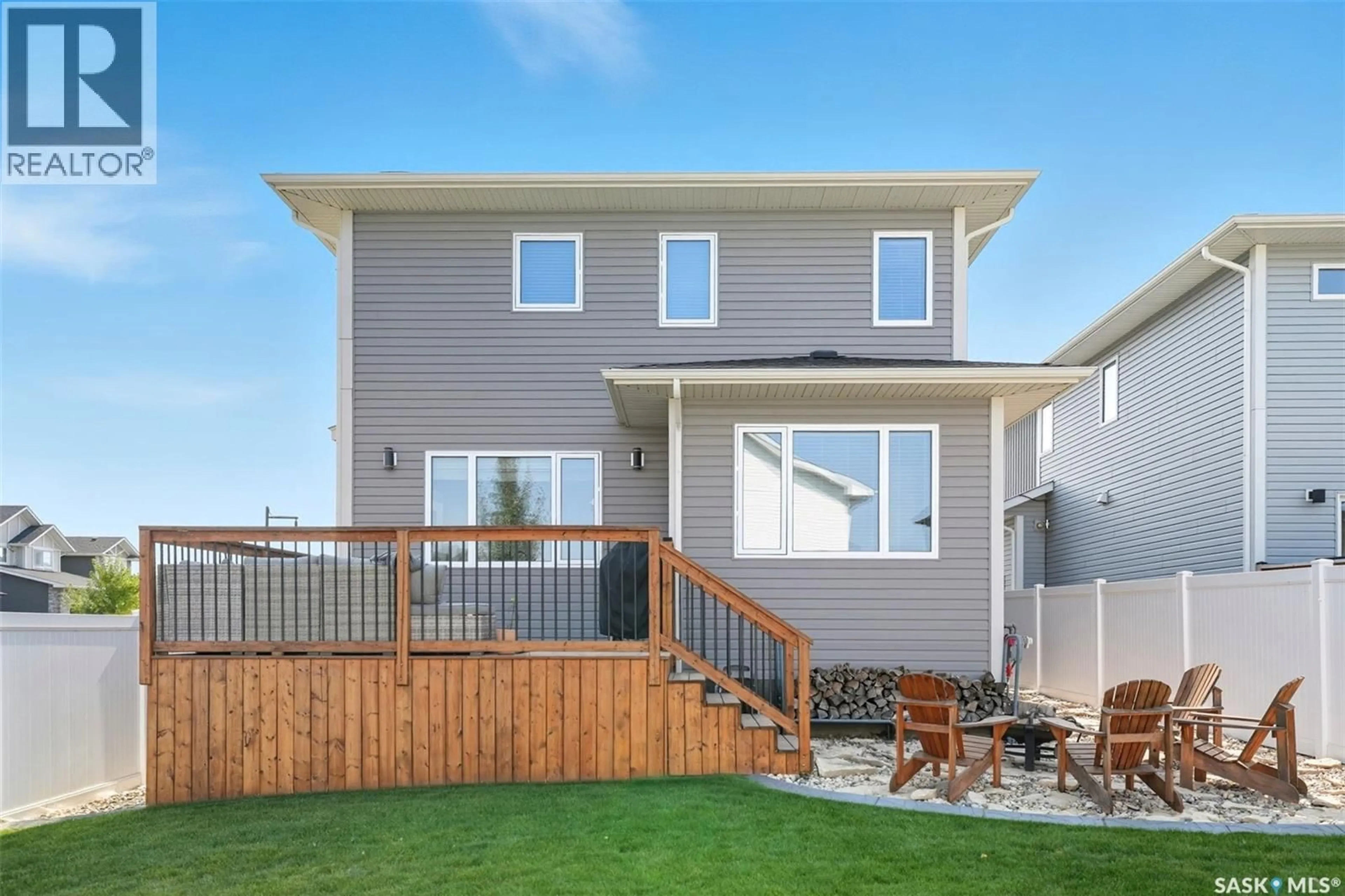 Home with vinyl exterior material, street for 387 UNDERHILL BEND, Saskatoon Saskatchewan S7V0N1