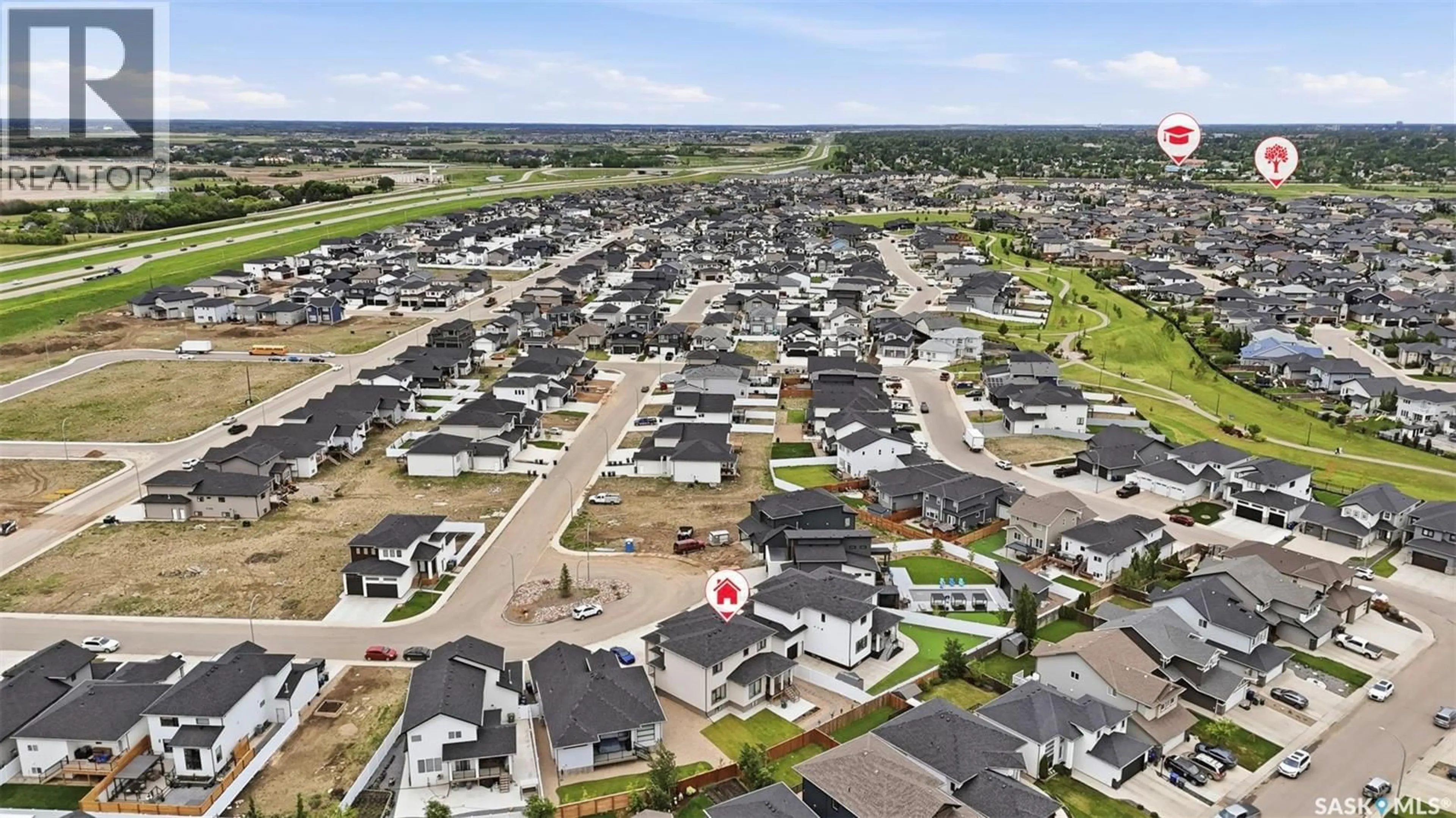 A pic from outside/outdoor area/front of a property/back of a property/a pic from drone, street for 255 FLYNN COVE, Saskatoon Saskatchewan S7V0J8