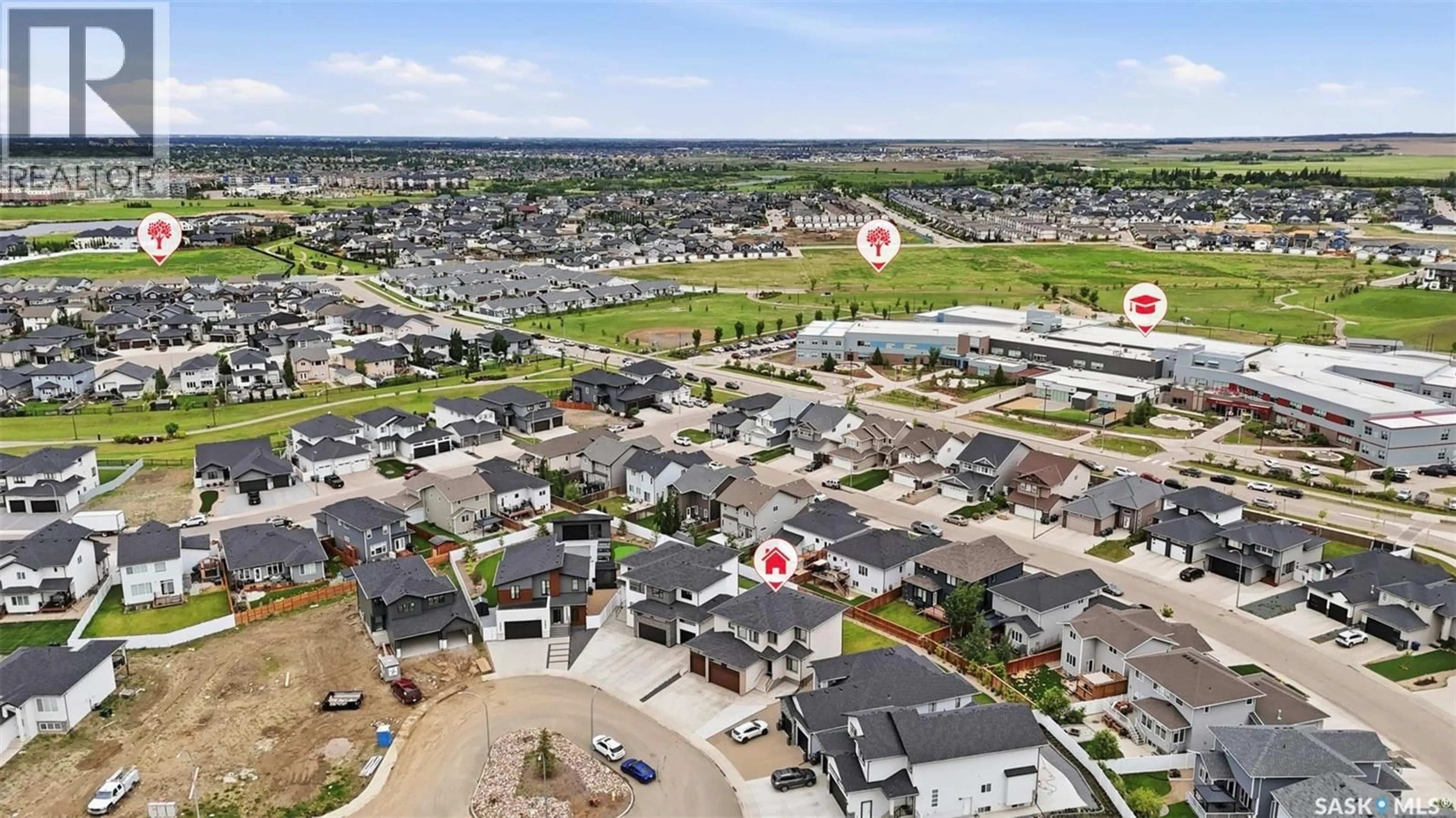 A pic from outside/outdoor area/front of a property/back of a property/a pic from drone, unknown for 255 FLYNN COVE, Saskatoon Saskatchewan S7V0J8