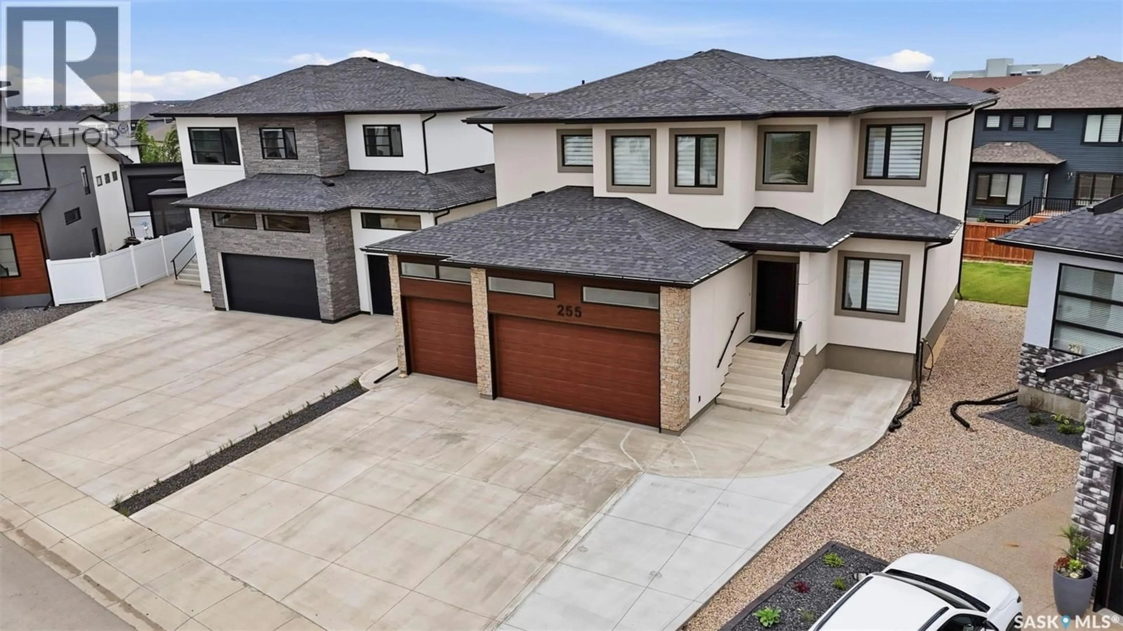 A pic from outside/outdoor area/front of a property/back of a property/a pic from drone, street for 255 FLYNN COVE, Saskatoon Saskatchewan S7V0J8