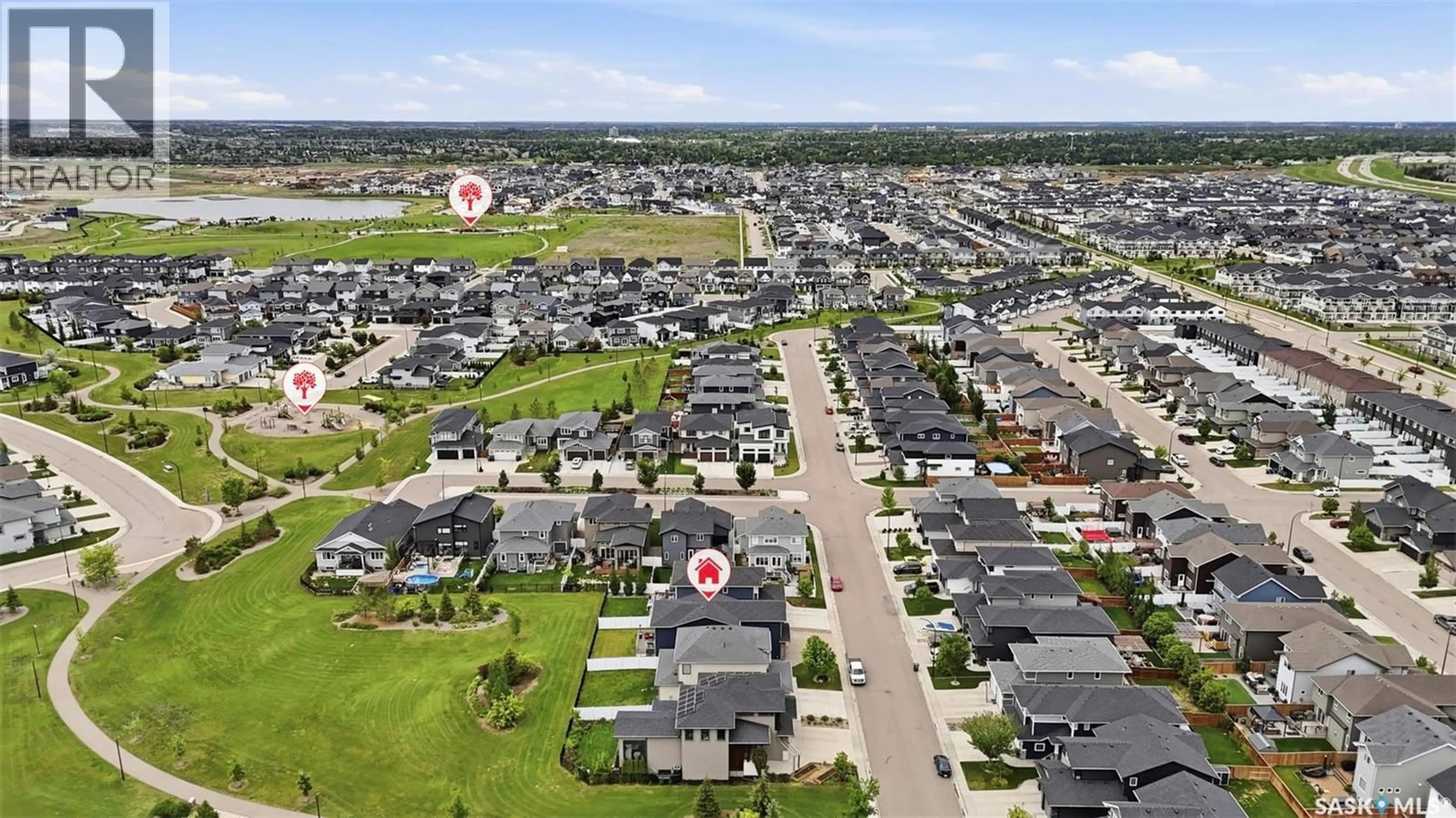 A pic from outside/outdoor area/front of a property/back of a property/a pic from drone, street for 322 DAGNONE CRESCENT, Saskatoon Saskatchewan S7V0P7
