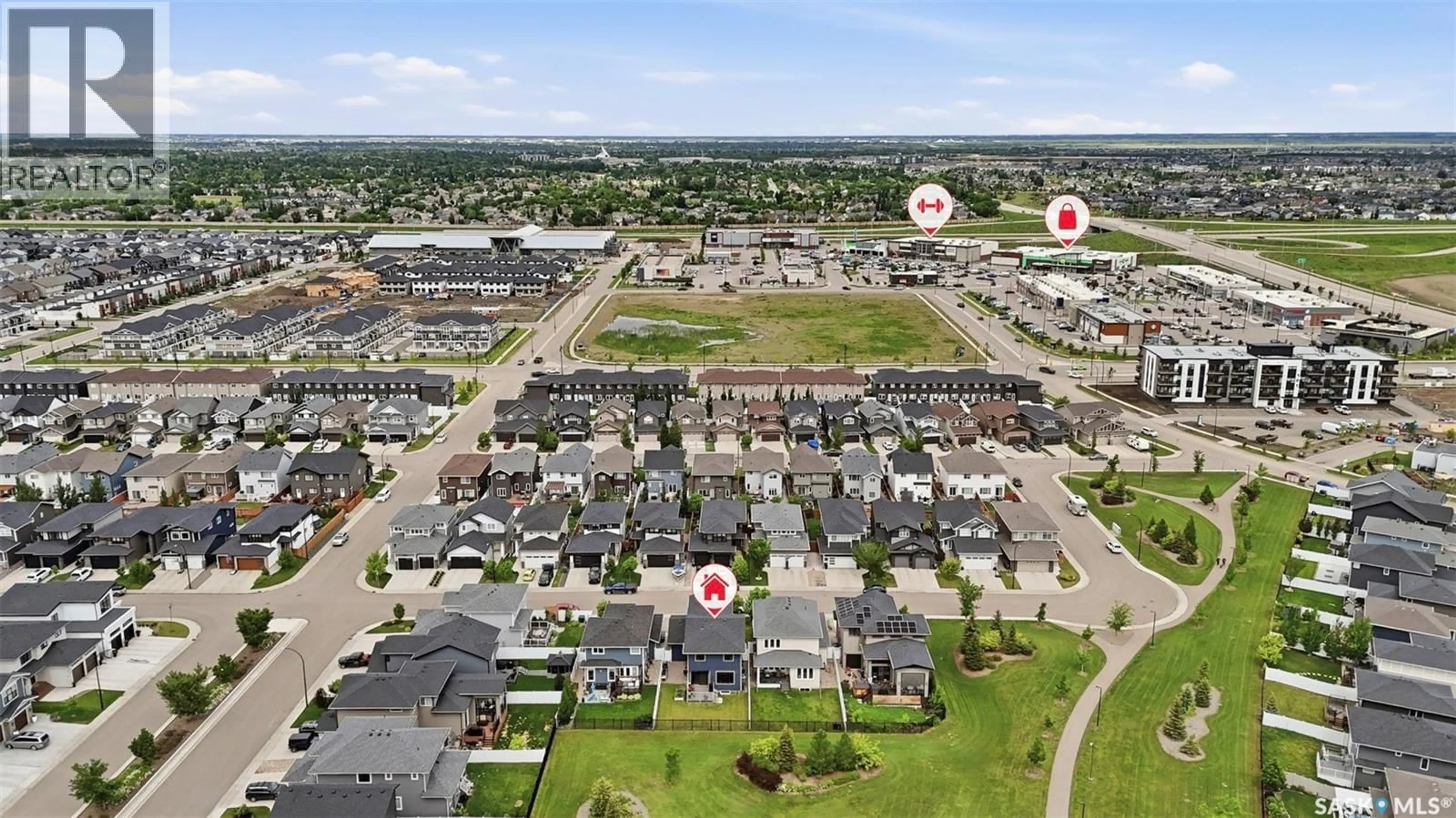 A pic from outside/outdoor area/front of a property/back of a property/a pic from drone, street for 322 DAGNONE CRESCENT, Saskatoon Saskatchewan S7V0P7