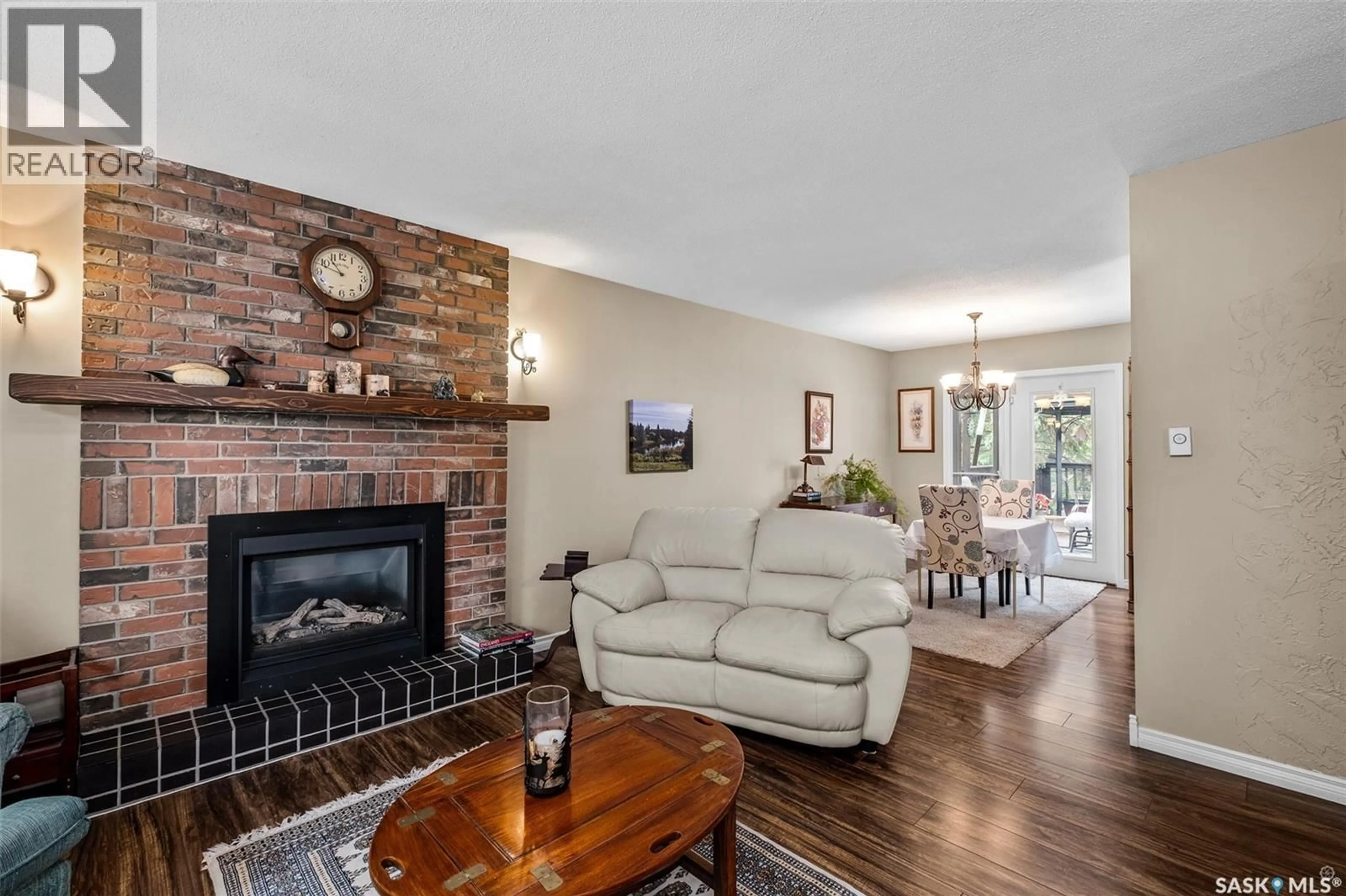 Living room with furniture, wood/laminate floor for 2834 DUNN DRIVE, Prince Albert Saskatchewan S6V6K7