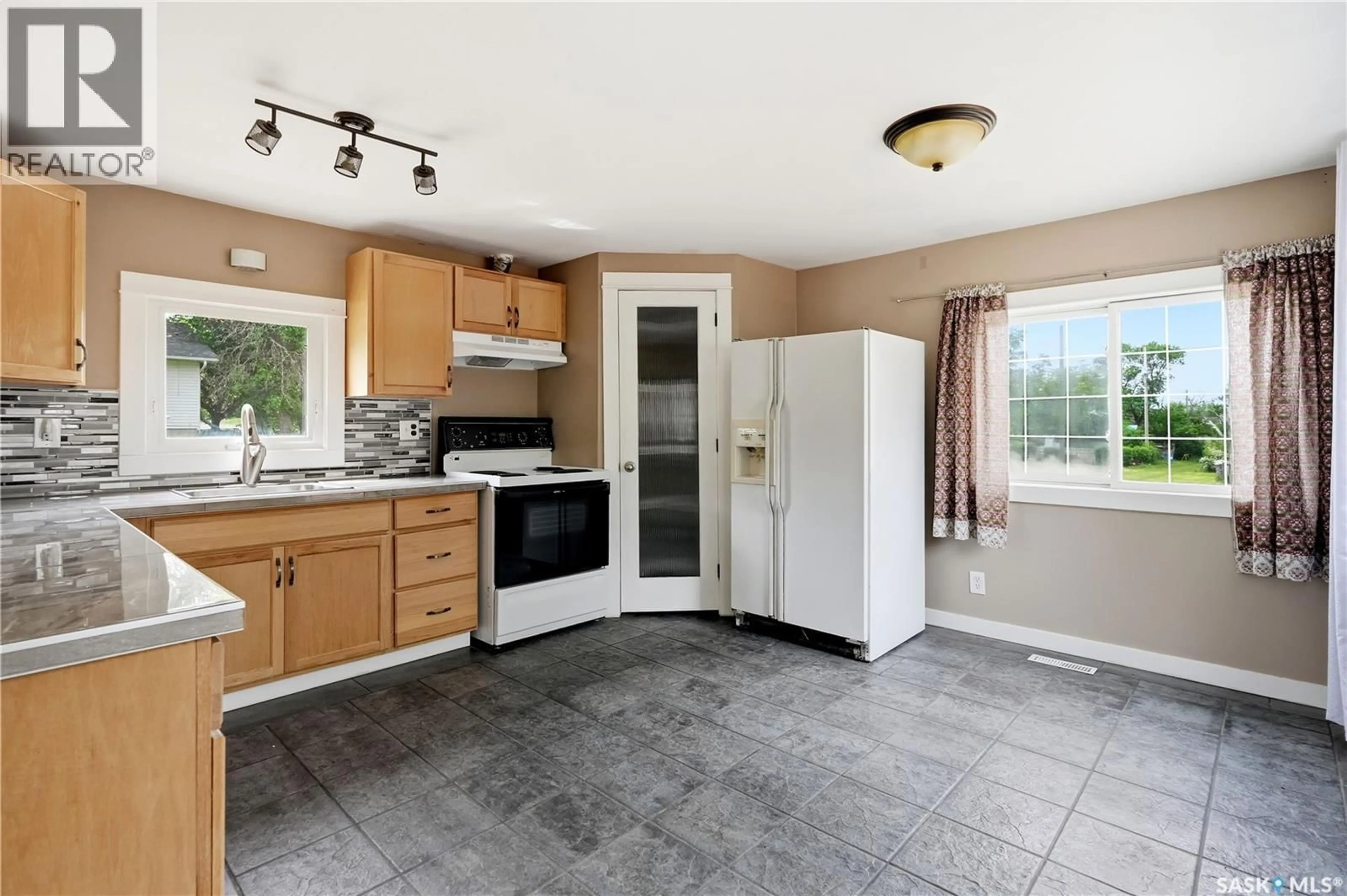 Standard kitchen, ceramic/tile floor for 123 3RD STREET, Lafleche Saskatchewan S0H2K0