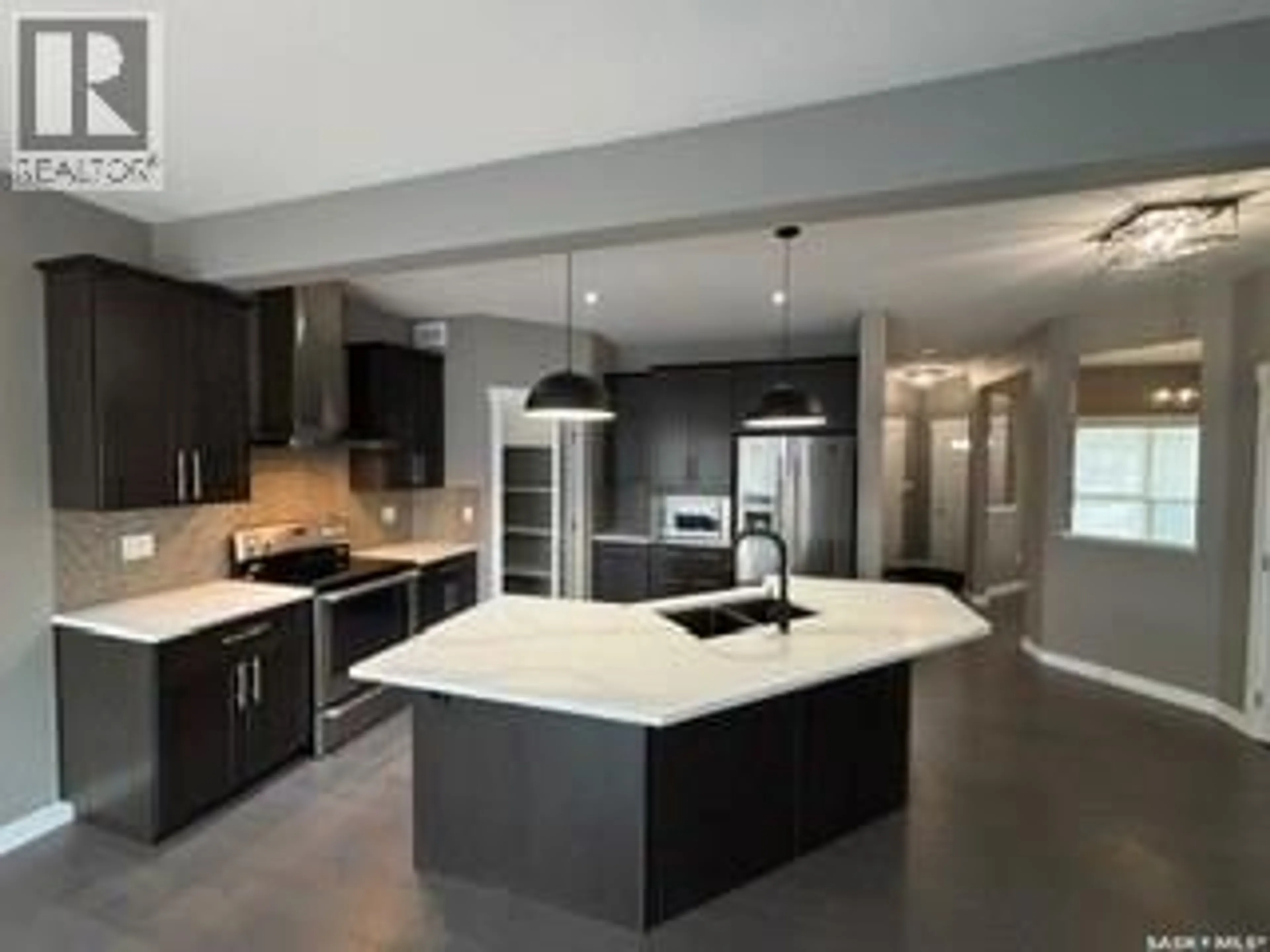 Open concept kitchen, unknown for 411 FLYNN LANE, Saskatoon Saskatchewan S7V0L1