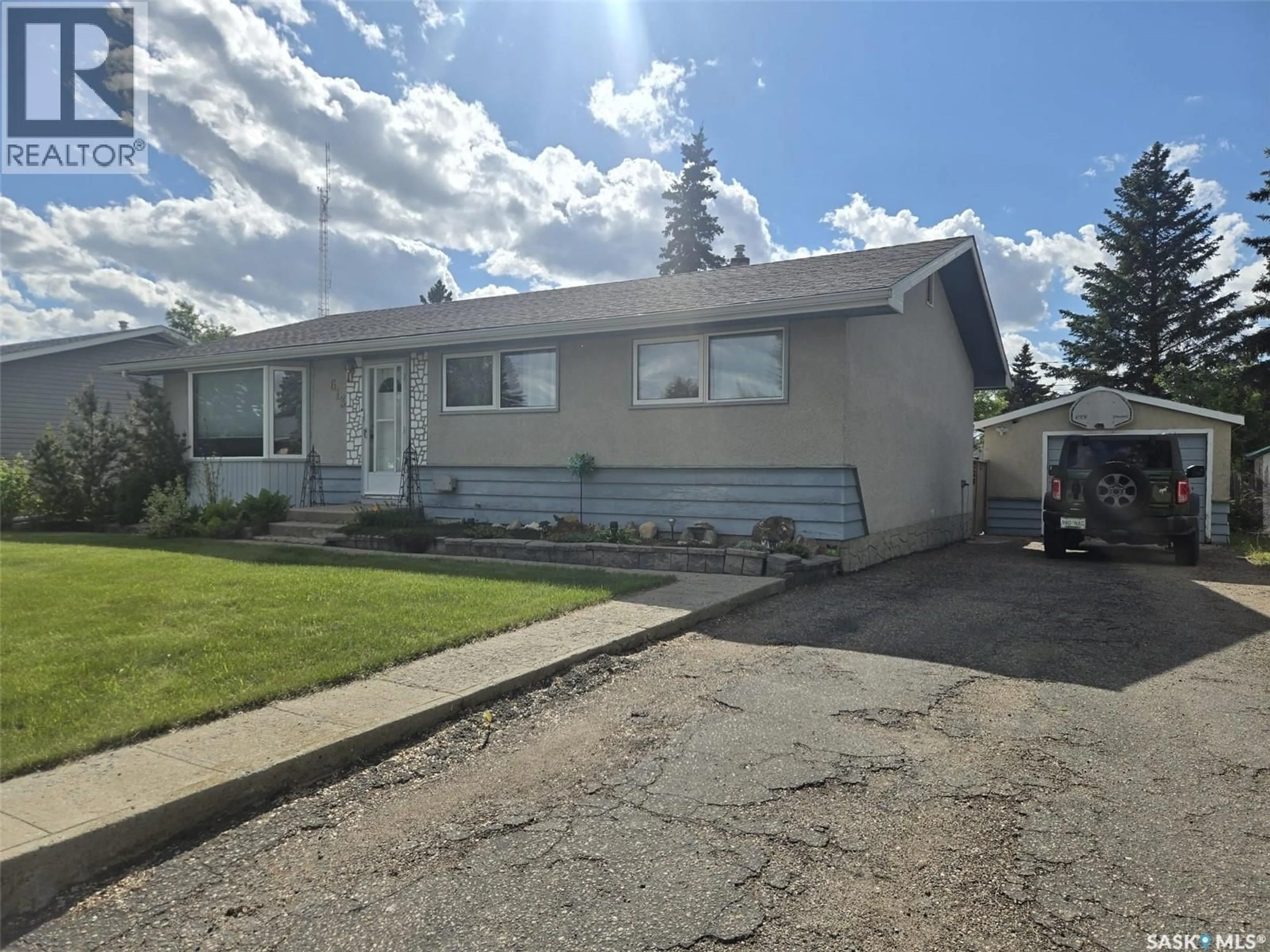 Home with vinyl exterior material, street for 613 3RD STREET, Wilkie Saskatchewan S0K4W0