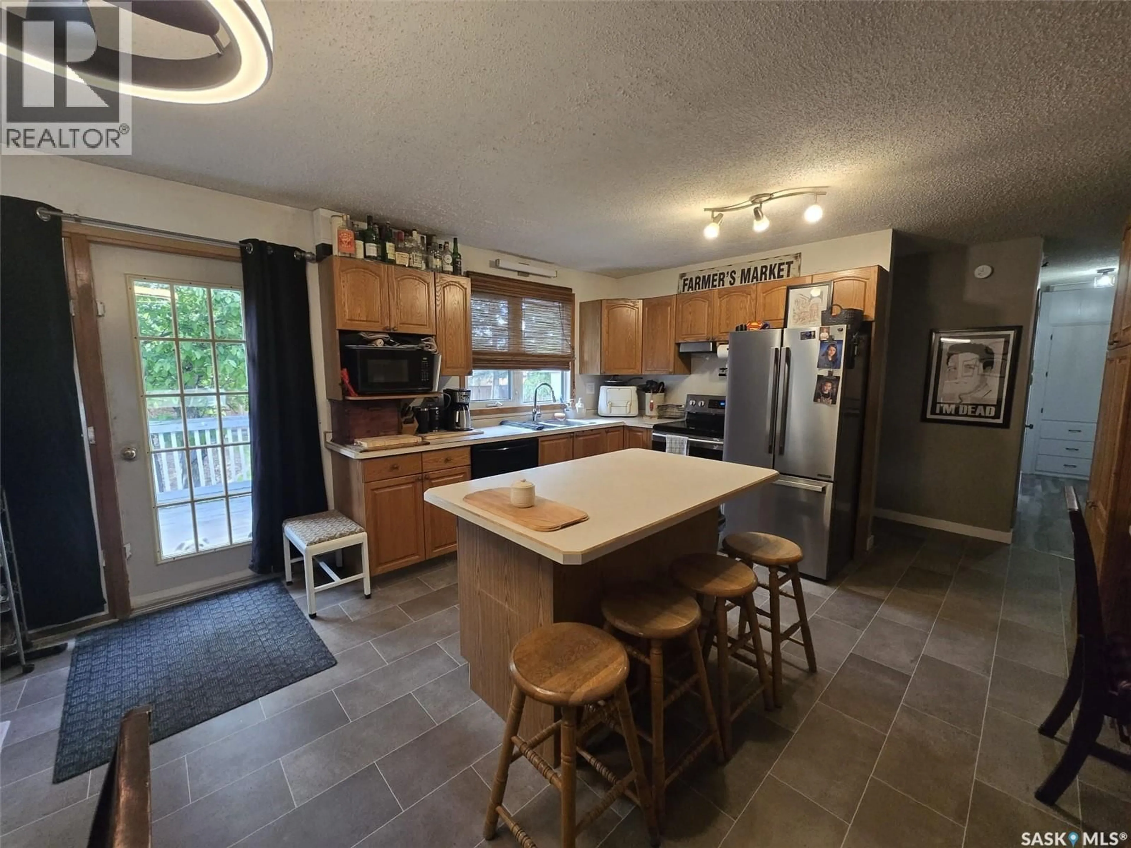 Open concept kitchen, unknown for 613 3RD STREET, Wilkie Saskatchewan S0K4W0