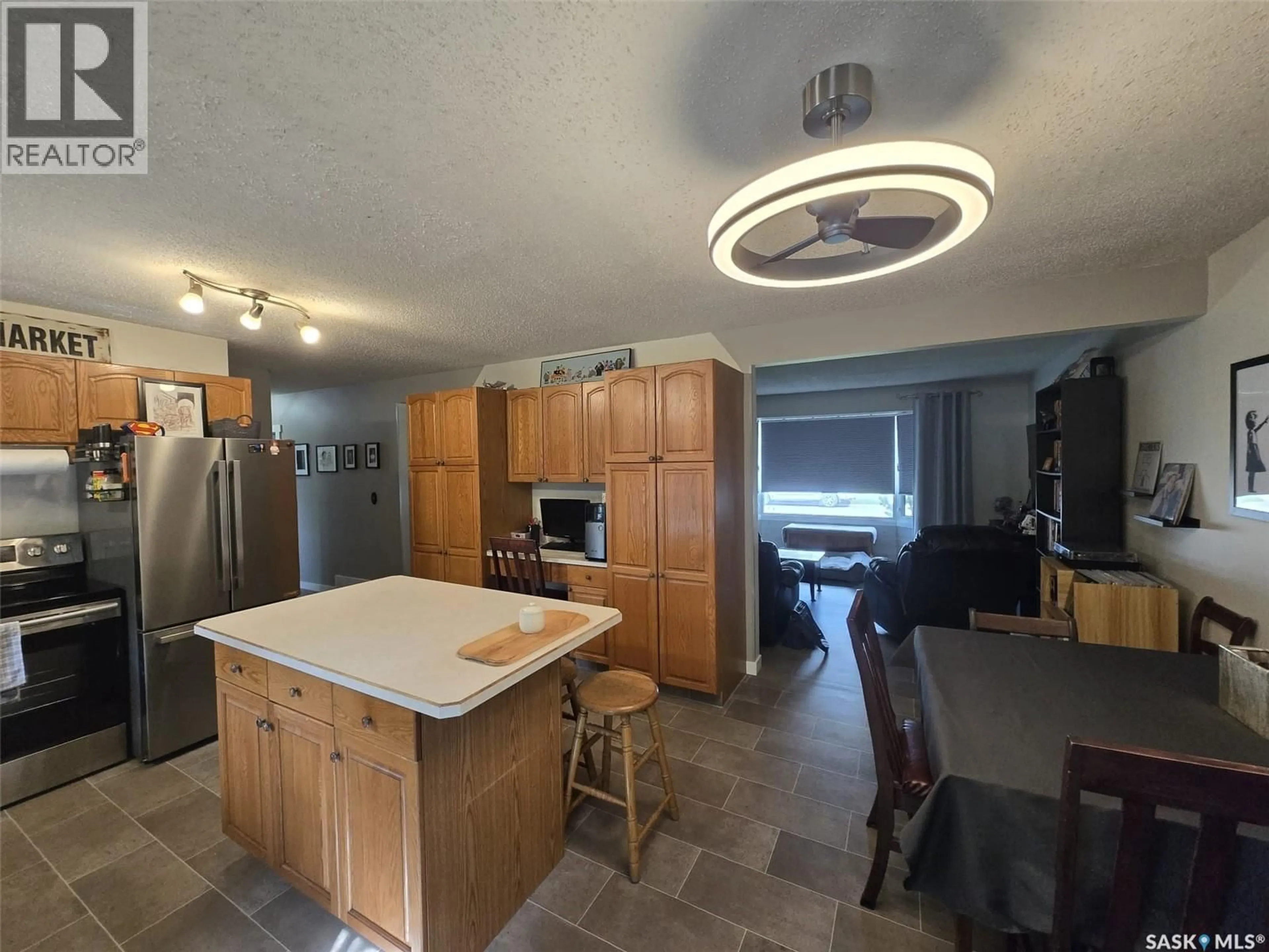 Open concept kitchen, unknown for 613 3RD STREET, Wilkie Saskatchewan S0K4W0