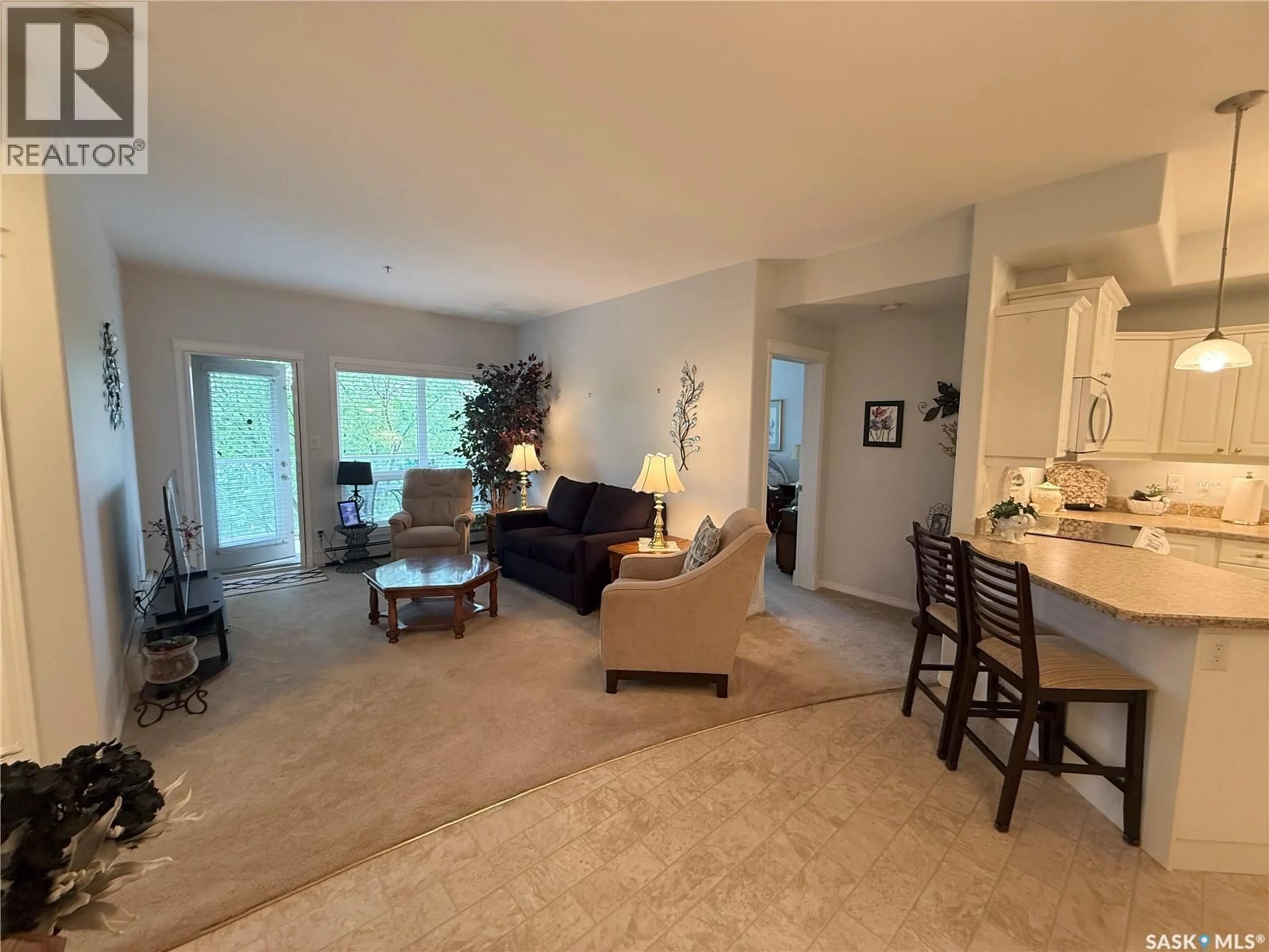 Living room with furniture, unknown for 313 102 ARMISTICE WAY, Saskatoon Saskatchewan S7J2Z6