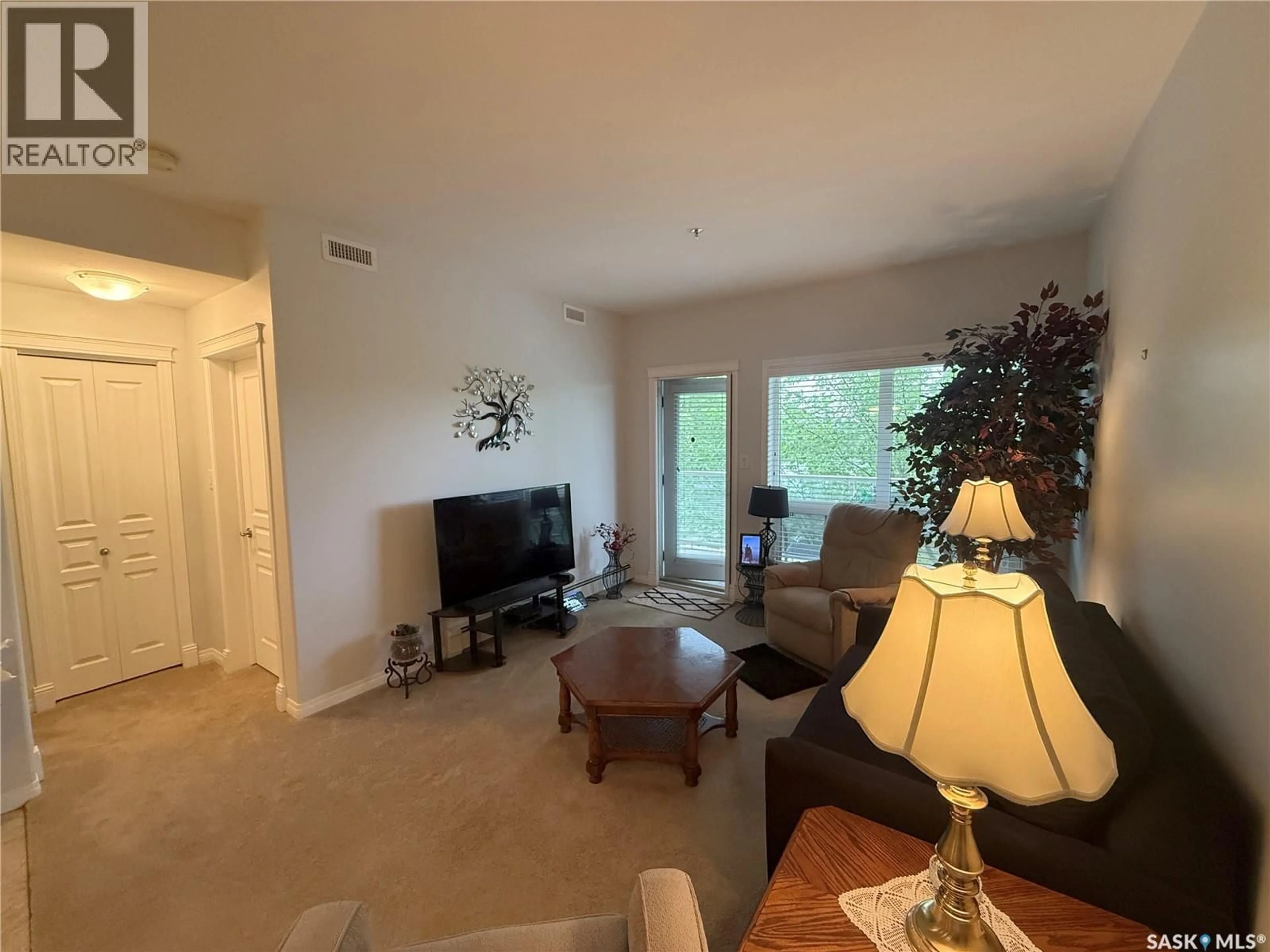 Living room with furniture, unknown for 313 102 ARMISTICE WAY, Saskatoon Saskatchewan S7J2Z6