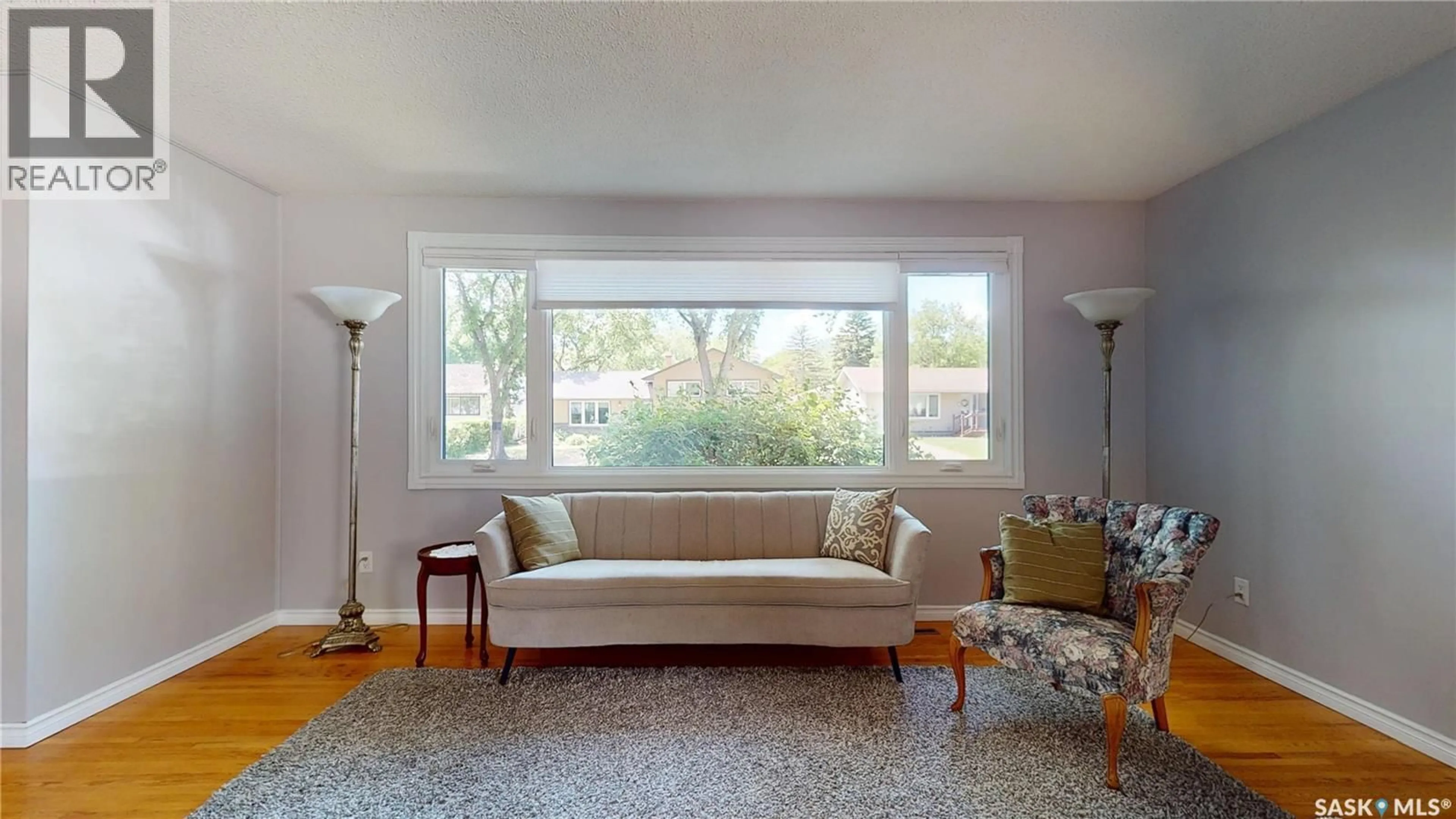 Living room with furniture, unknown for 85 BOBOLINK BAY, Regina Saskatchewan S4S4K2