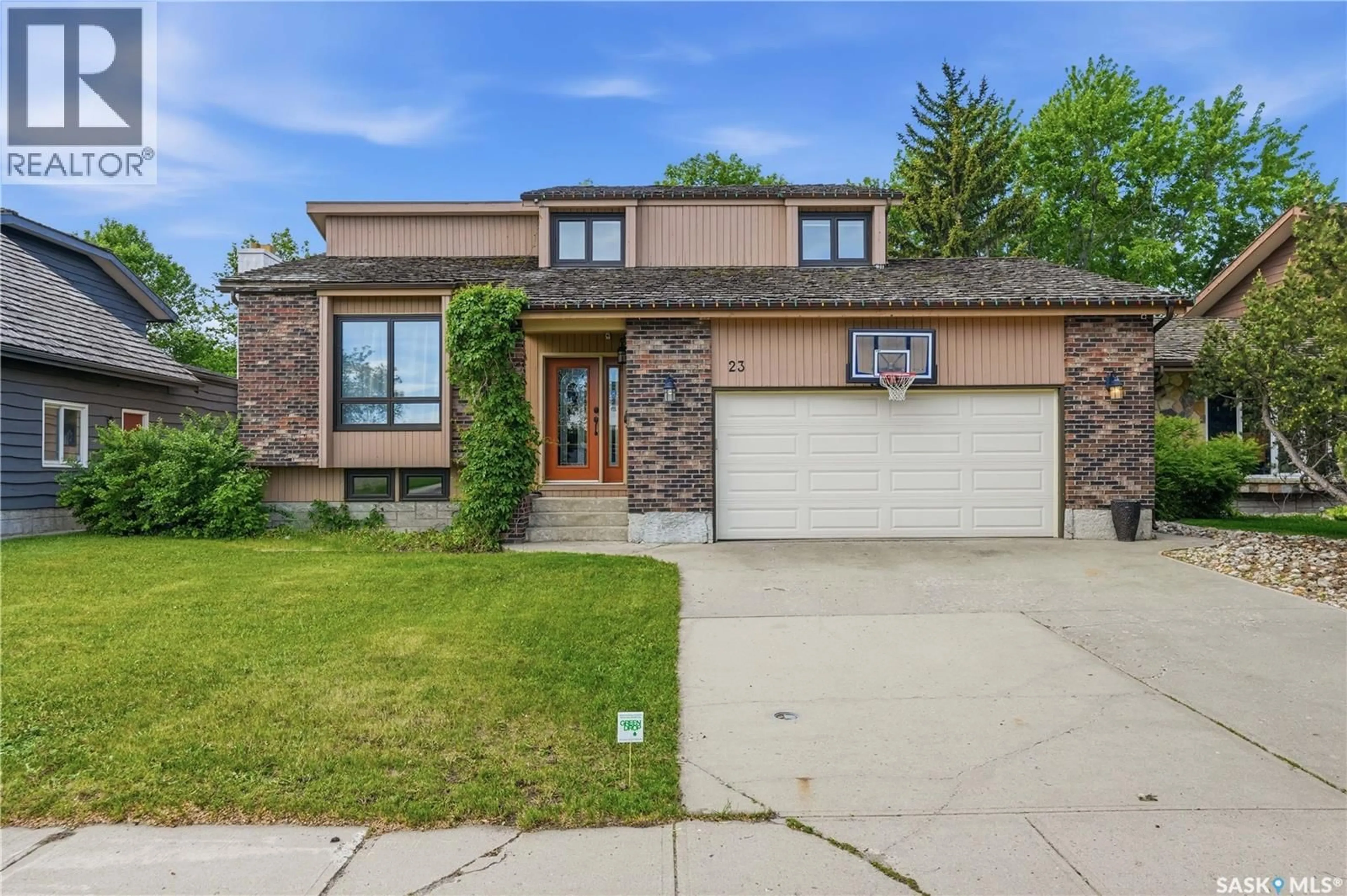 Home with brick exterior material, street for 23 COWIE ROAD, Regina Saskatchewan S4S6S2