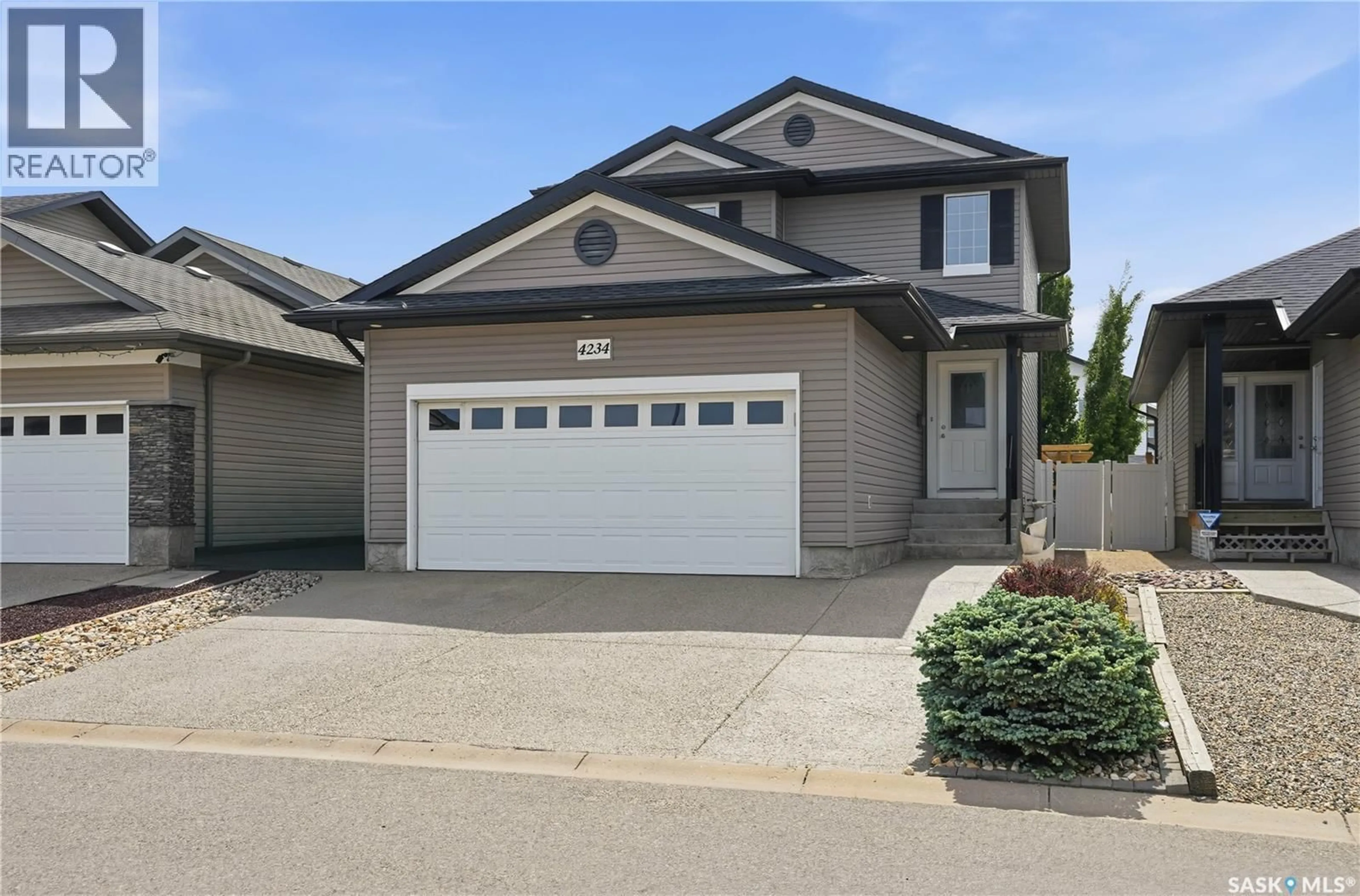 Home with vinyl exterior material, street for 4234 NICURITY DRIVE, Regina Saskatchewan S4X0C1