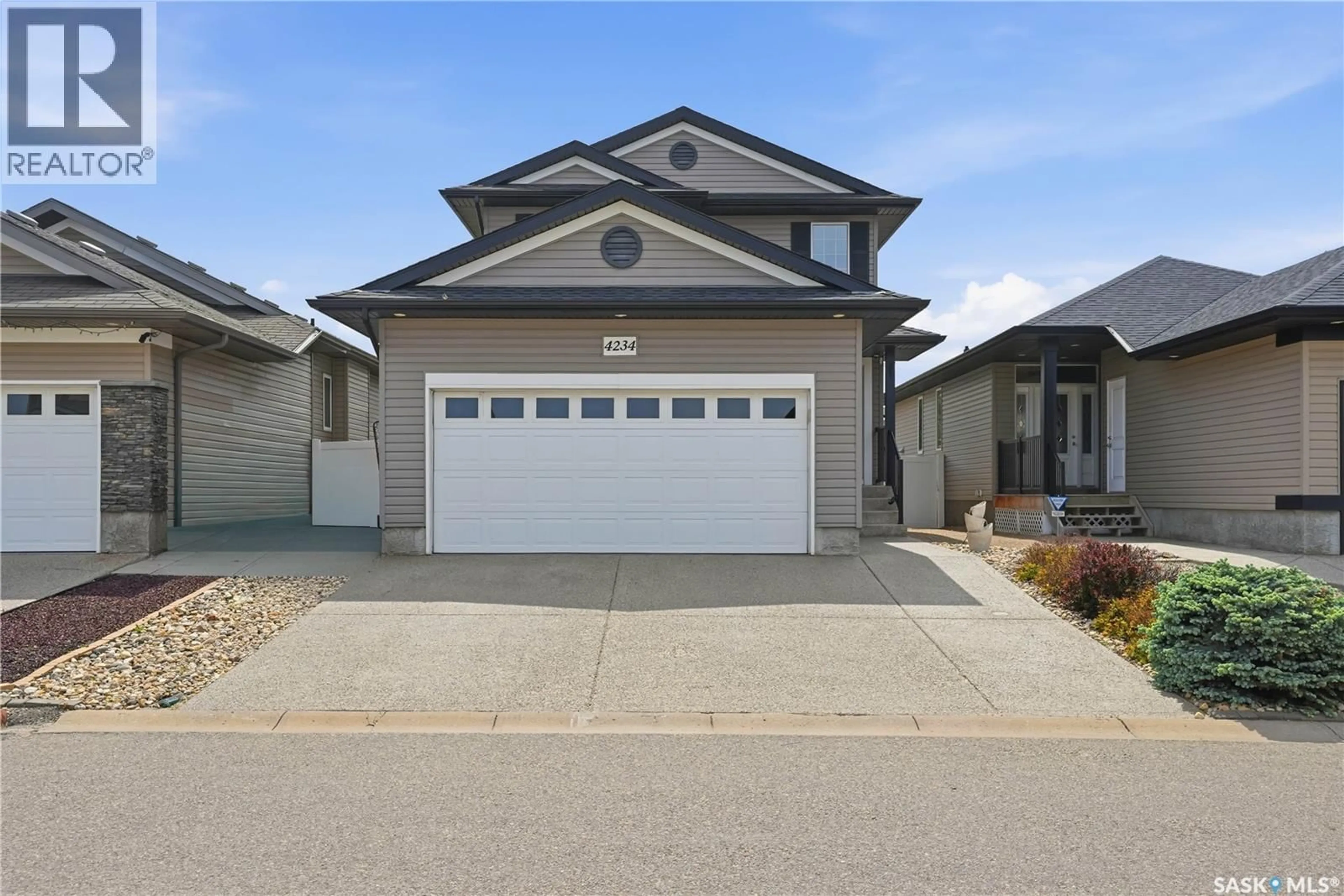 Home with vinyl exterior material, street for 4234 NICURITY DRIVE, Regina Saskatchewan S4X0C1