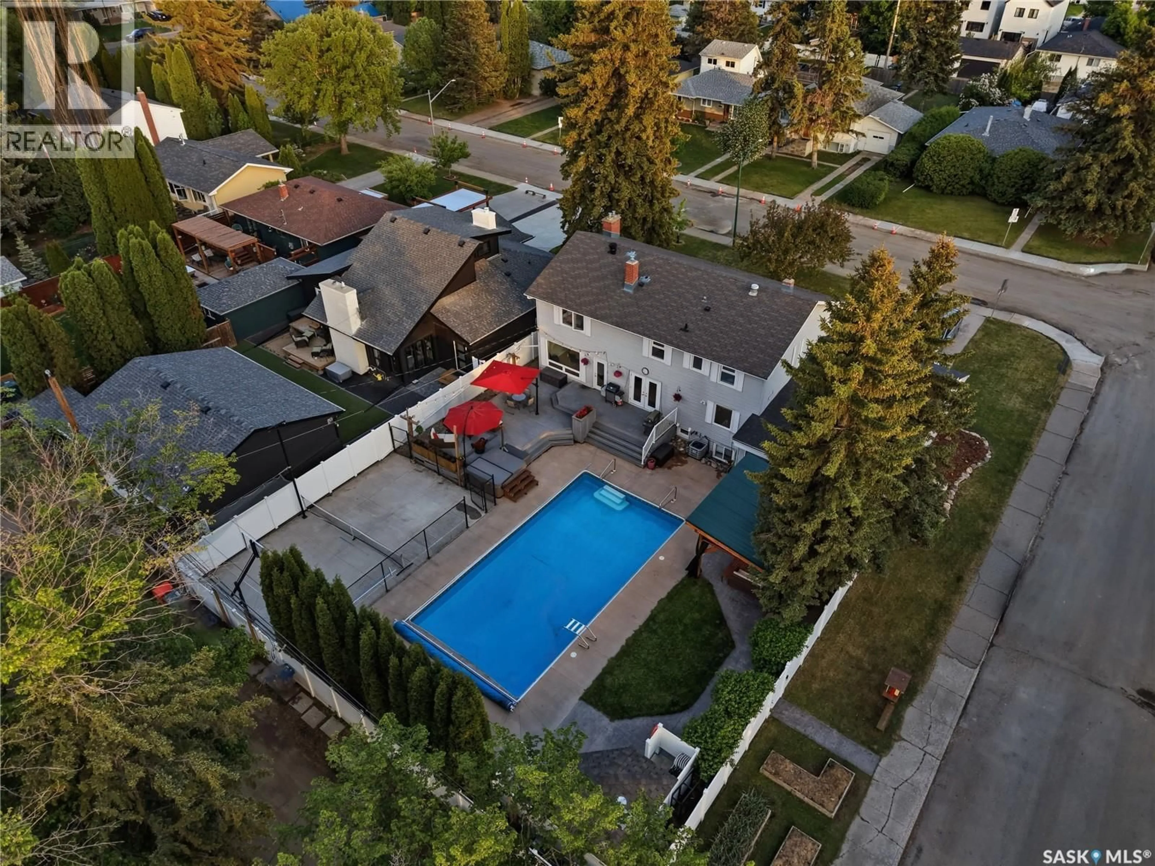 A pic from outside/outdoor area/front of a property/back of a property/a pic from drone, street for 1401 13TH STREET, Saskatoon Saskatchewan S7H0C7