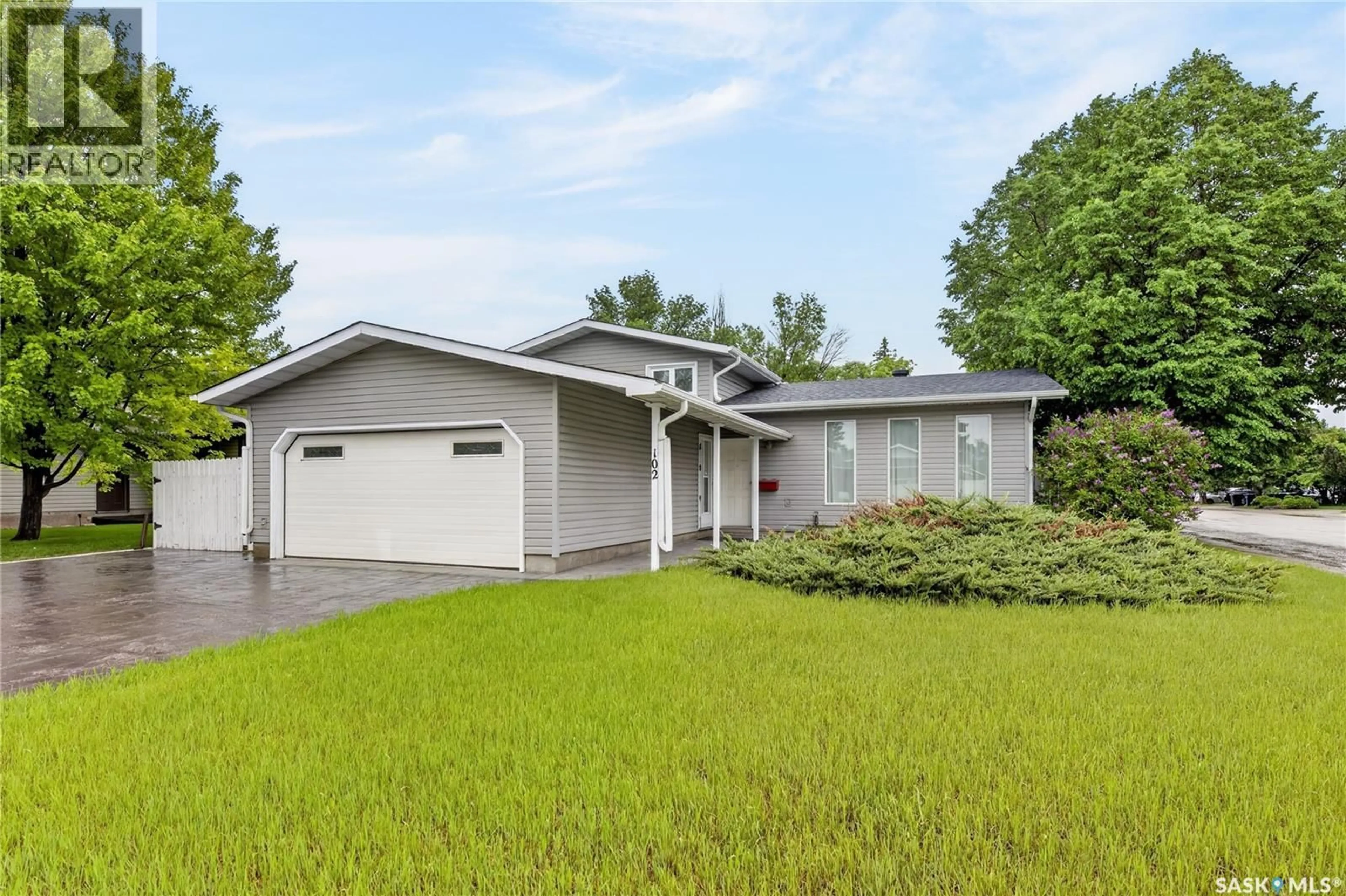 Home with vinyl exterior material, street for 102 ALLEGRETTO CRESCENT, Saskatoon Saskatchewan S7K6R5
