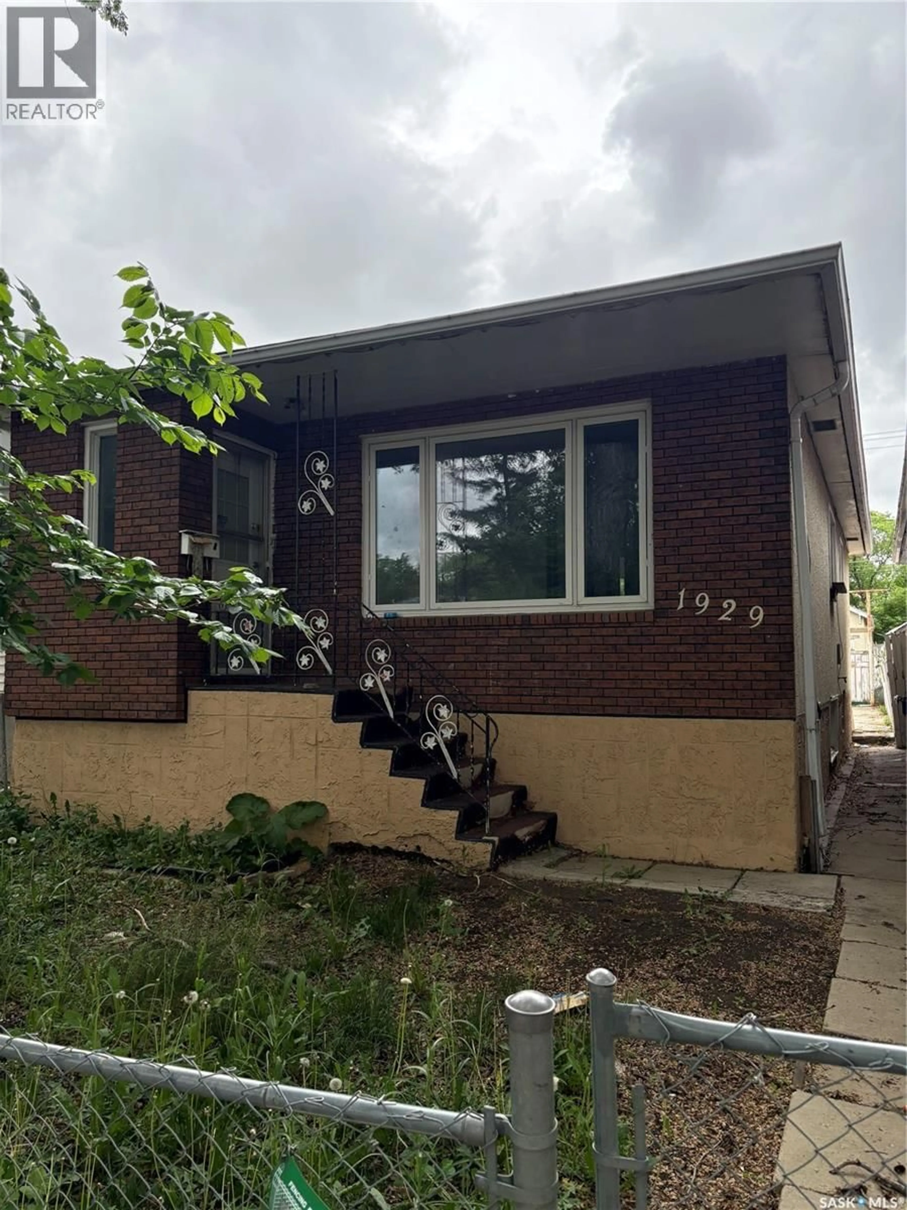Home with brick exterior material, street for 1929 QUEBEC STREET, Regina Saskatchewan S4P1J8
