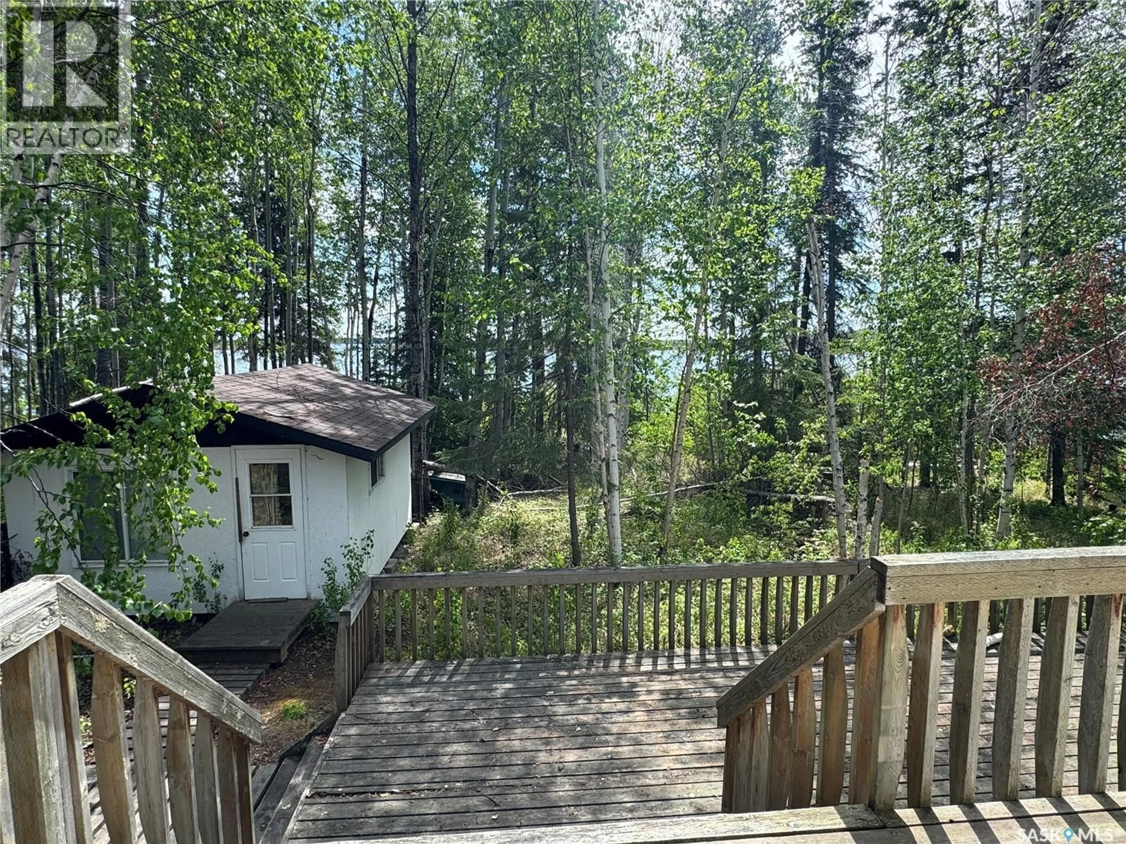 A pic from outside/outdoor area/front of a property/back of a property/a pic from drone, forest/trees view for 803 WILLOW STREET, Lac La Ronge Provincial Park Saskatchewan S0J1L0