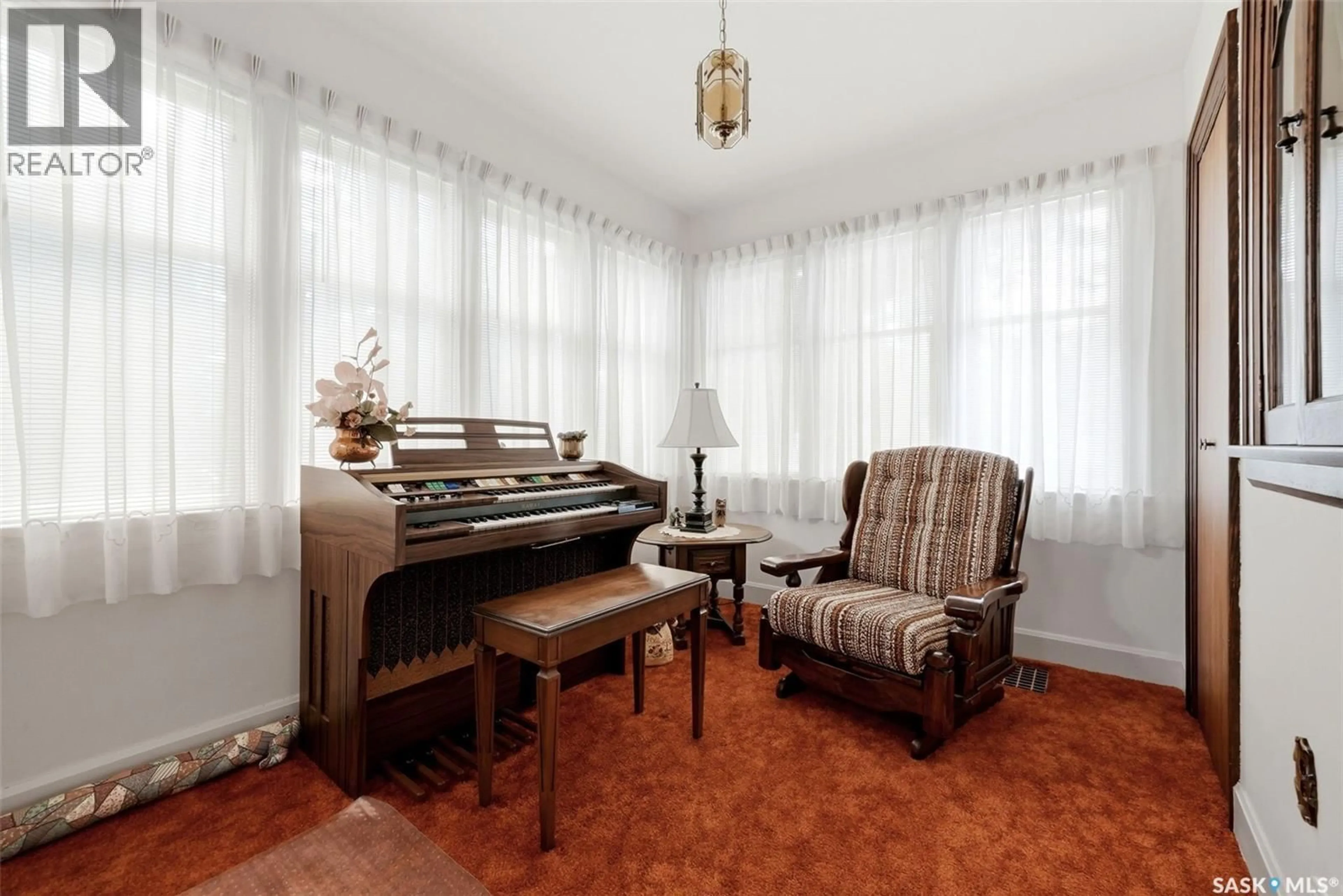 Living room with furniture, carpet floor for 2178 PRINCESS STREET, Regina Saskatchewan S4T3Z6