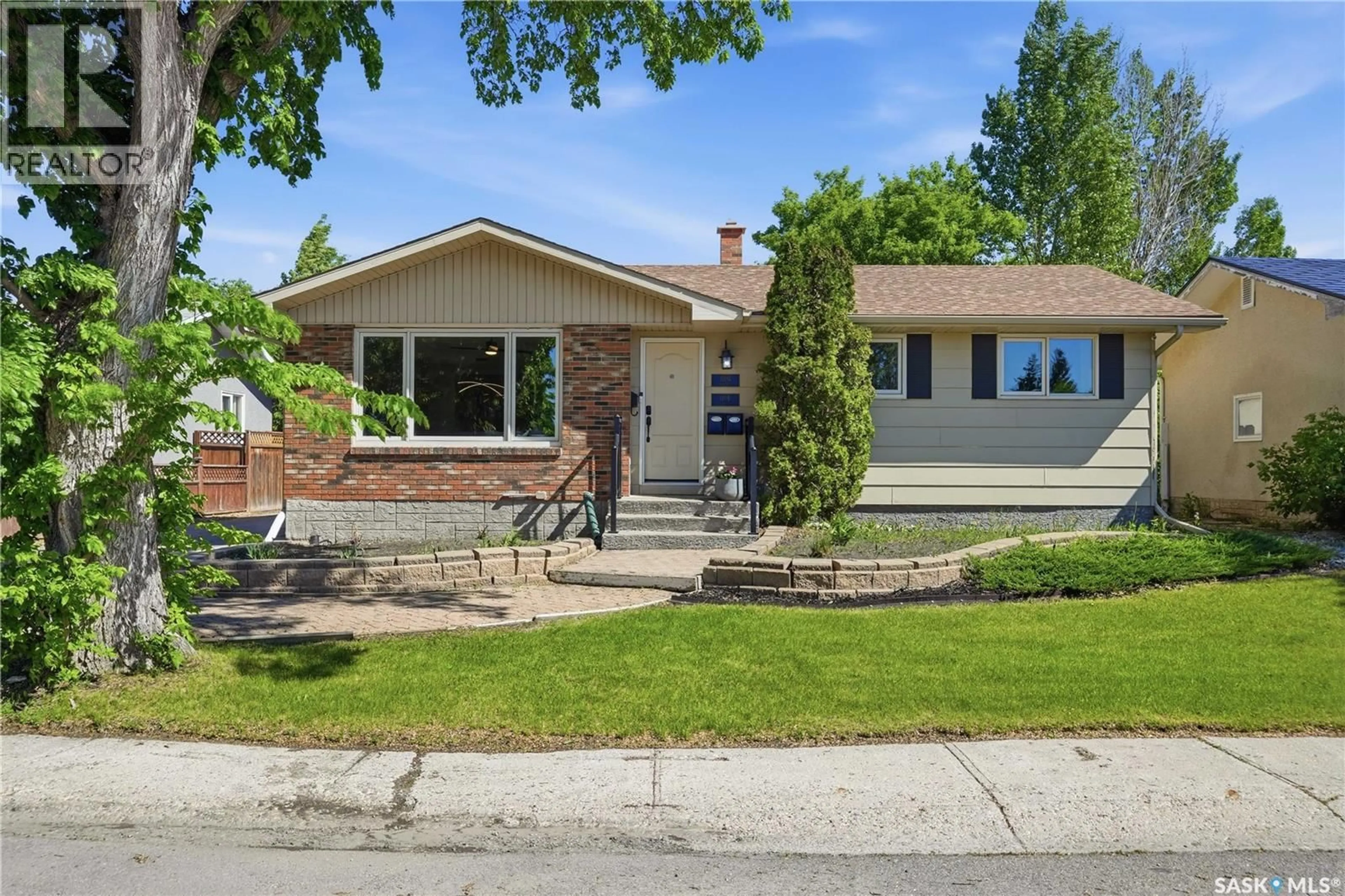 Home with vinyl exterior material, street for 110 LAUBACH CRESCENT, Regina Saskatchewan S4S6M3