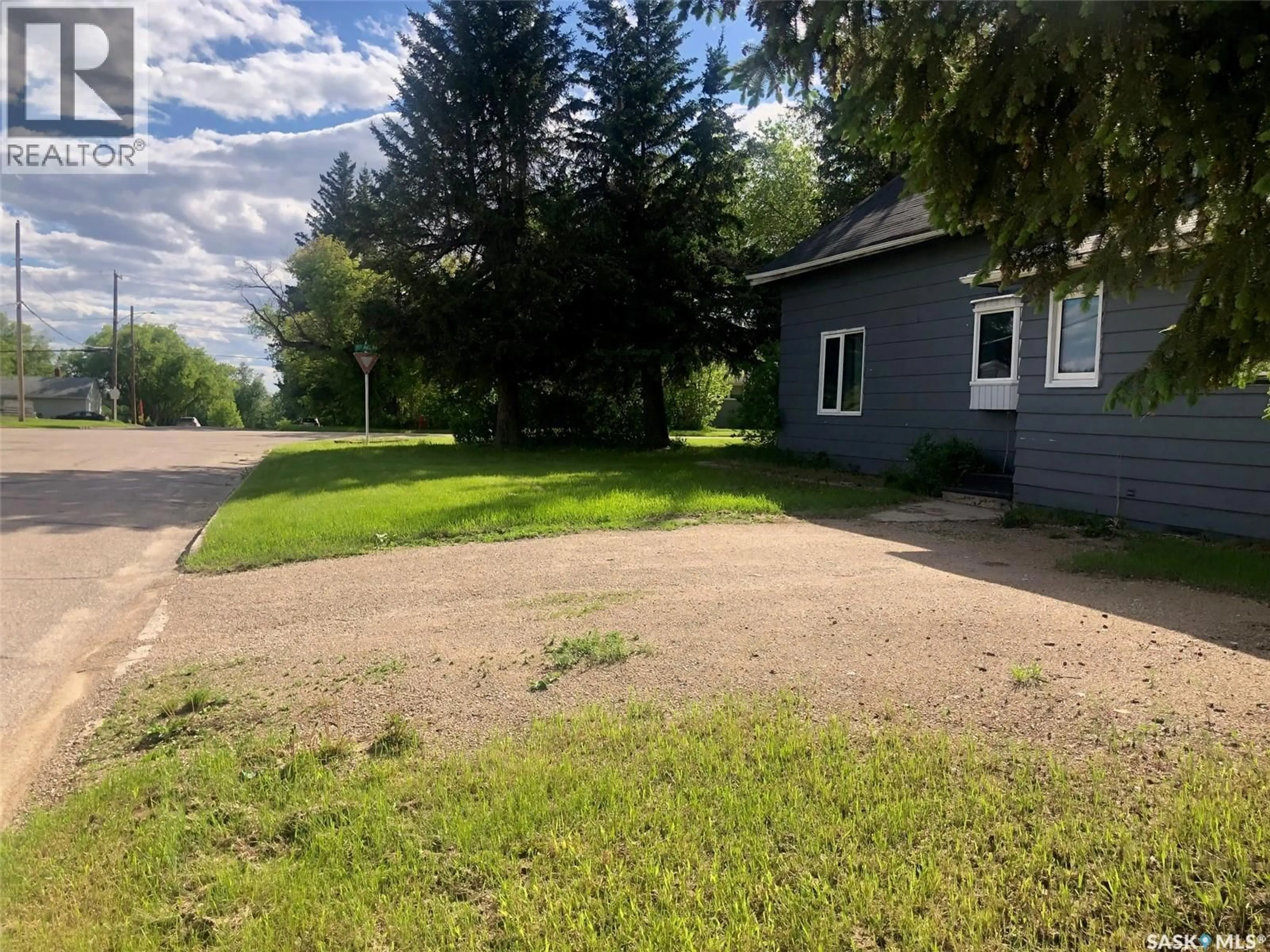 A pic from outside/outdoor area/front of a property/back of a property/a pic from drone, street for 202 1ST AVENUE, Preeceville Saskatchewan S0A3B0