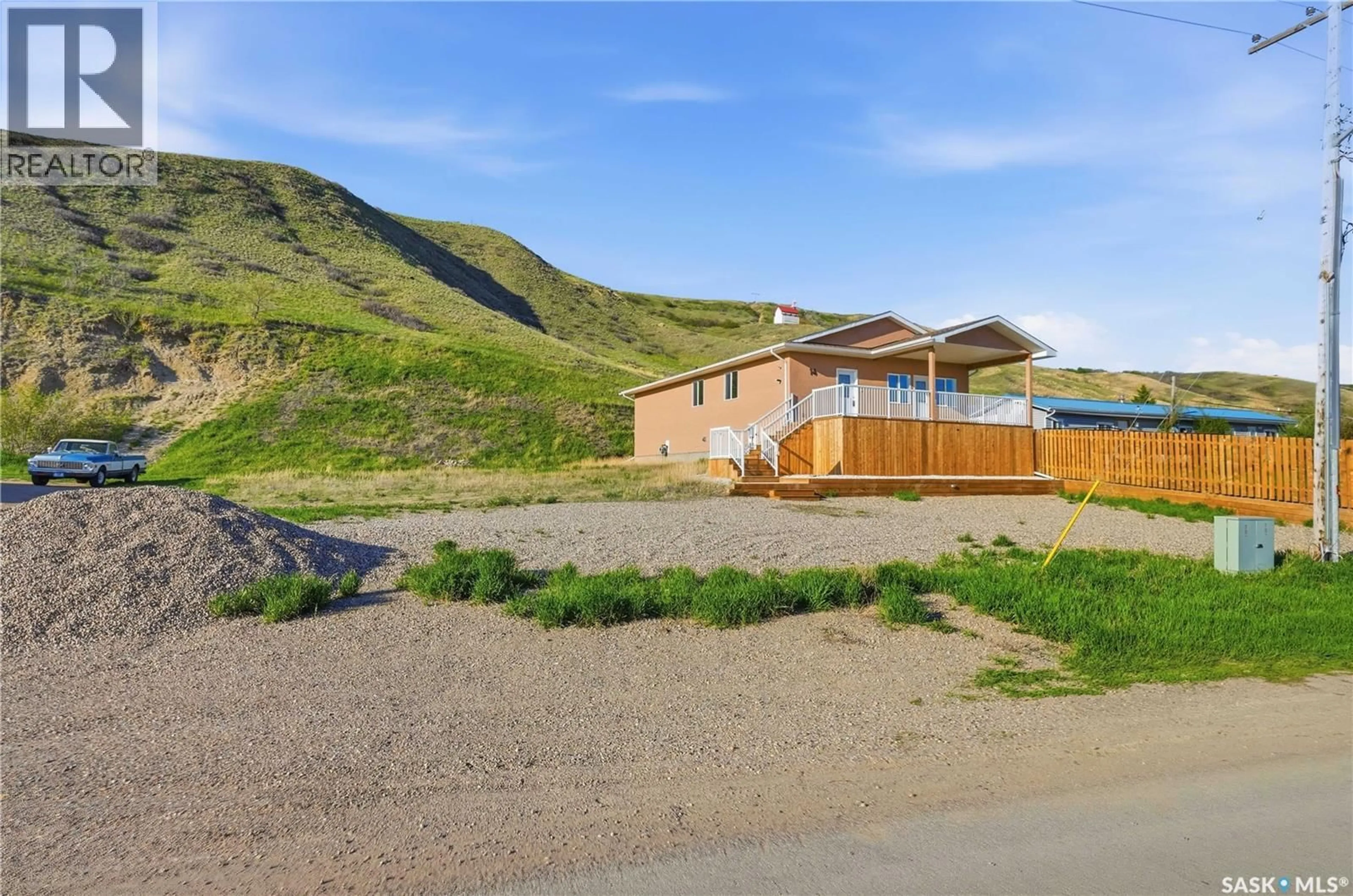 A pic from outside/outdoor area/front of a property/back of a property/a pic from drone, mountain view for 14 ELLISBORO TRAIL, Lebret Saskatchewan S0G2Y0