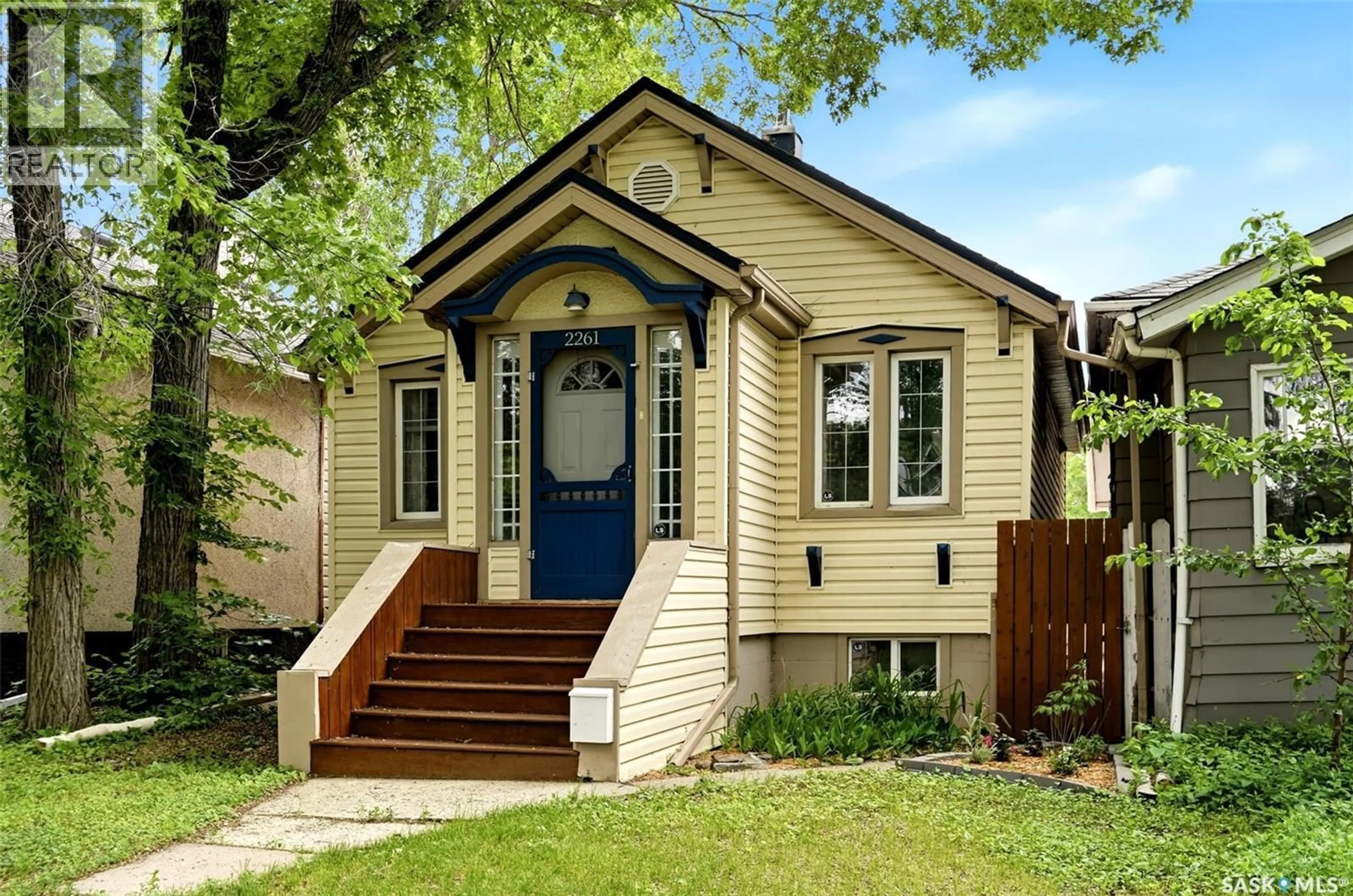 Home with vinyl exterior material, street for 2261 WINNIPEG STREET, Regina Saskatchewan S4P1H2