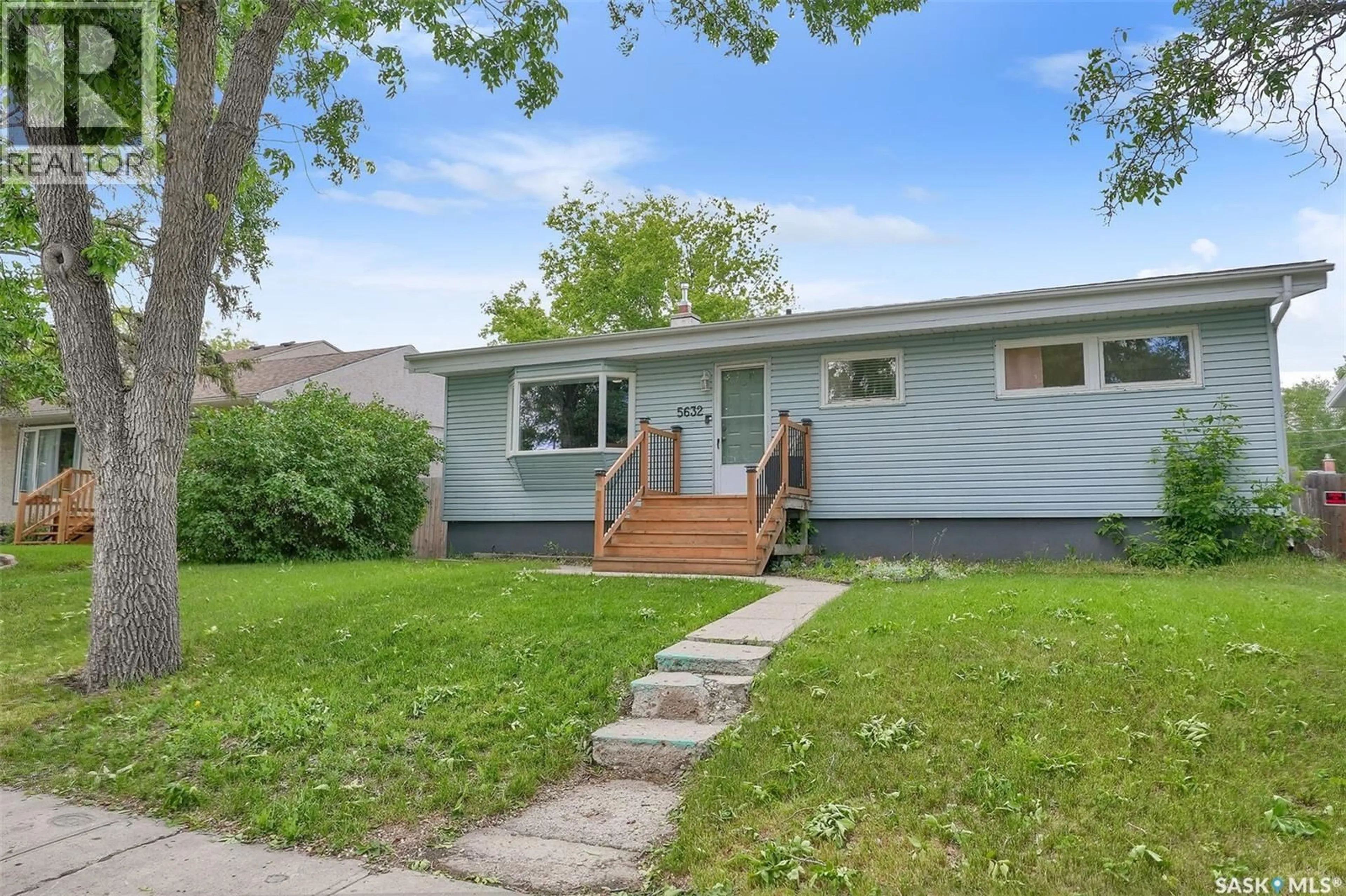 Home with vinyl exterior material, street for 5632 4TH AVENUE, Regina Saskatchewan S4T0J9
