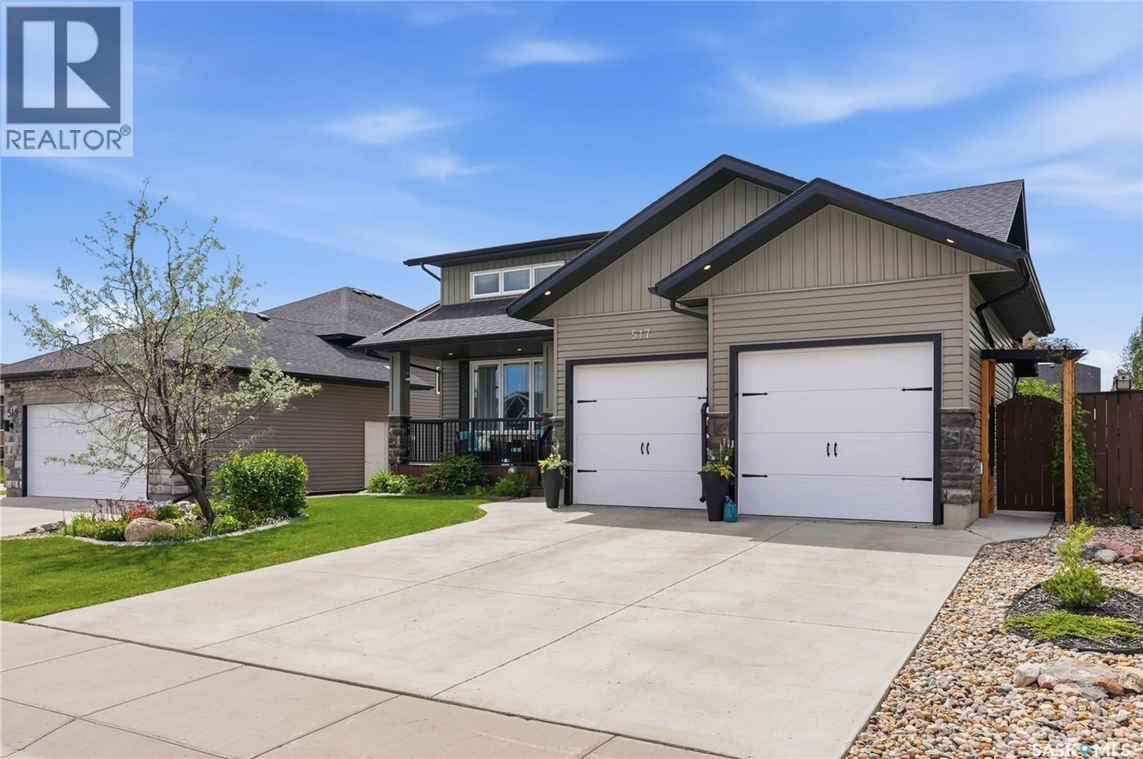 Home with brick exterior material, street for 517 PALMER CRESCENT, Warman Saskatchewan S0K4S1