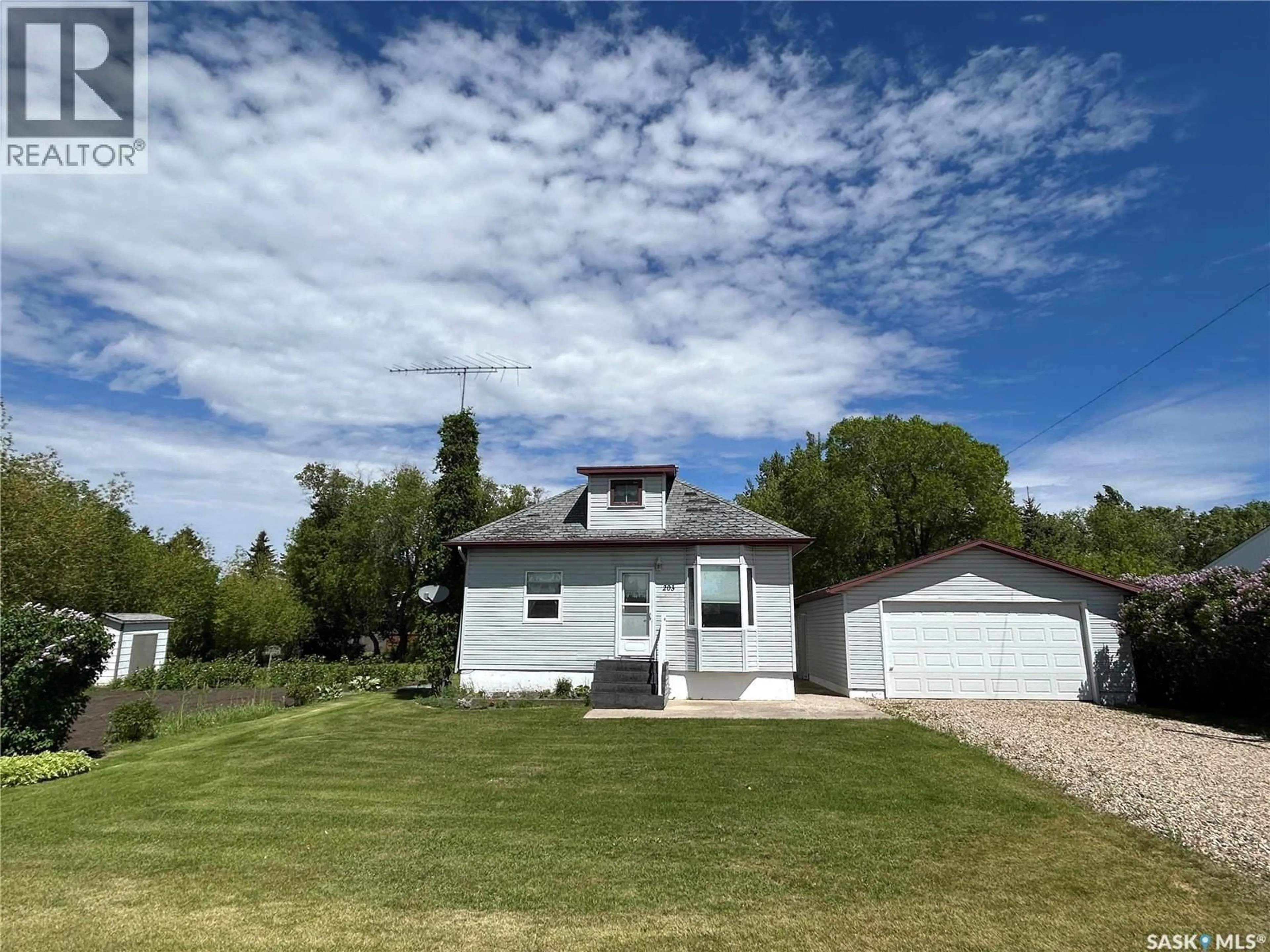 A pic from outside/outdoor area/front of a property/back of a property/a pic from drone, unknown for 203 PHILLIPS STREET, Muenster Saskatchewan S0K2Y0