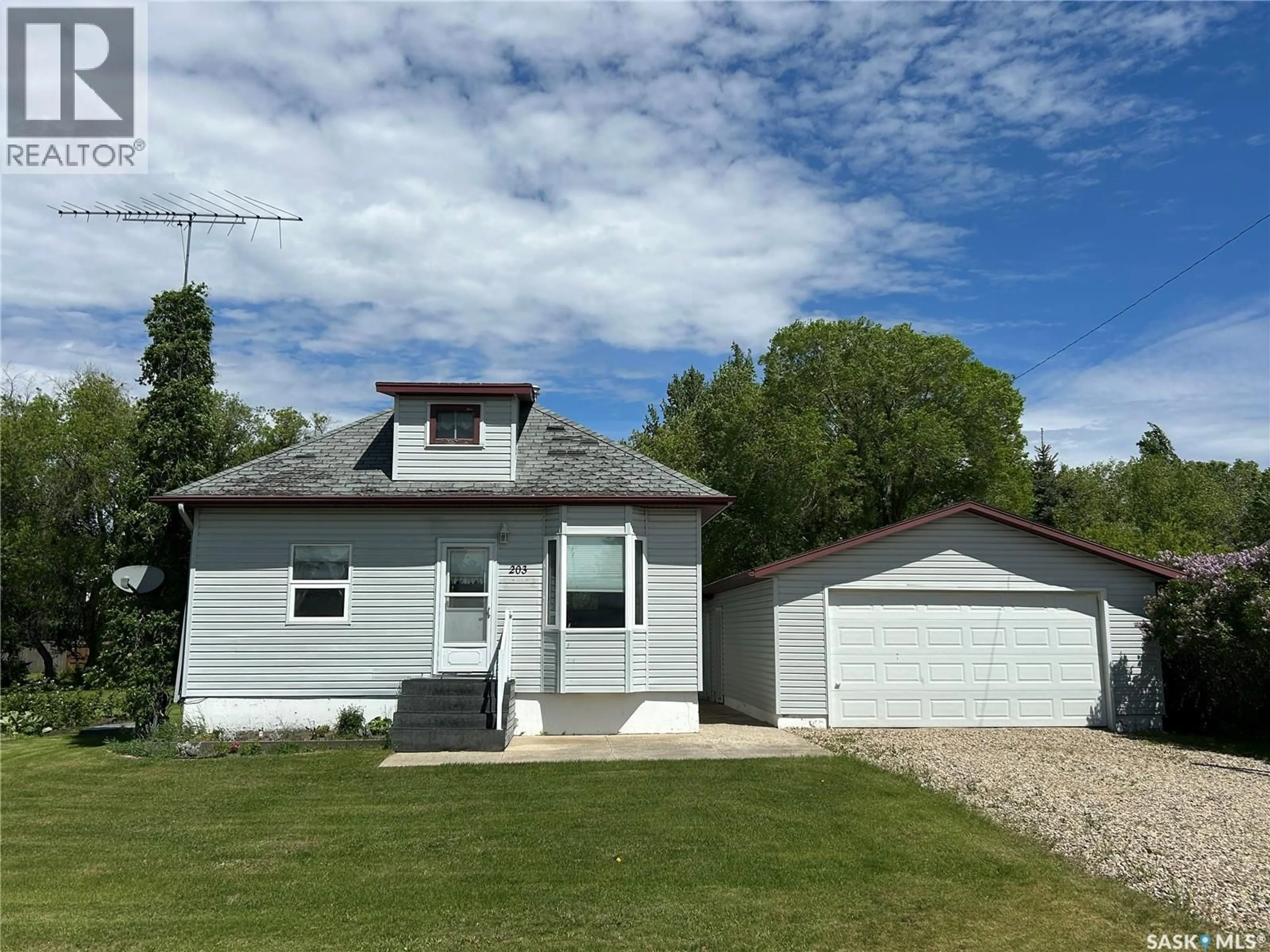 A pic from outside/outdoor area/front of a property/back of a property/a pic from drone, street for 203 PHILLIPS STREET, Muenster Saskatchewan S0K2Y0