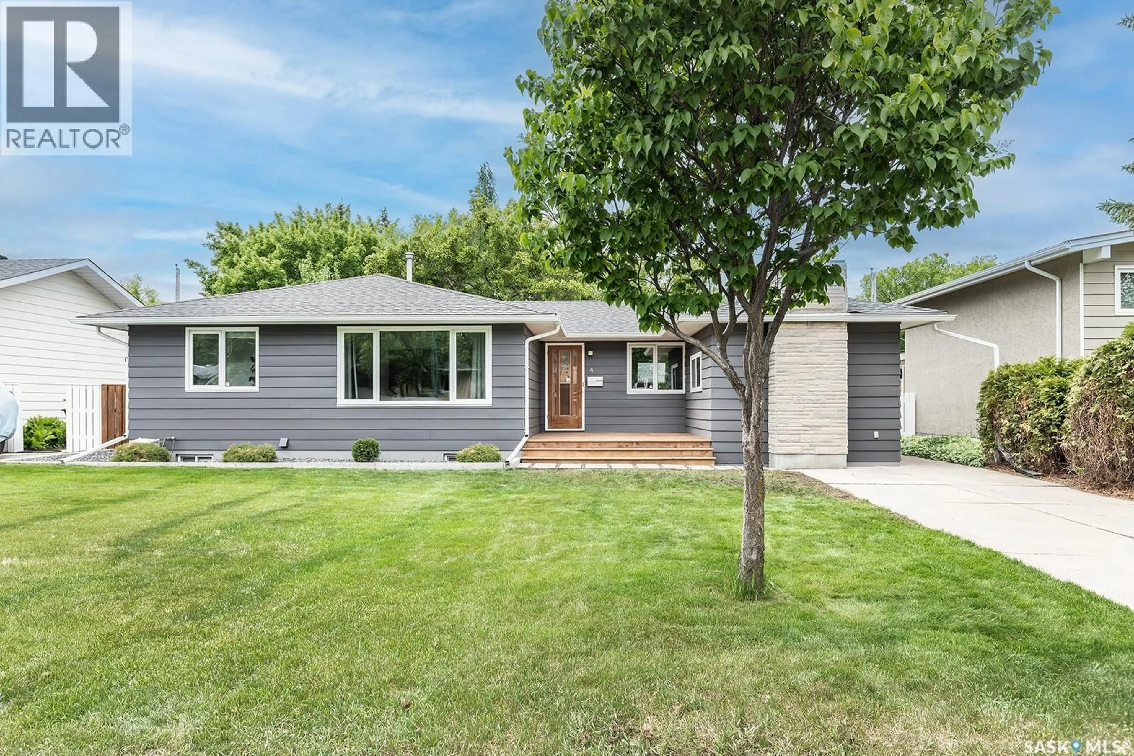 Home with vinyl exterior material, street for 4 RUTTER CRESCENT, Saskatoon Saskatchewan S7H3B7