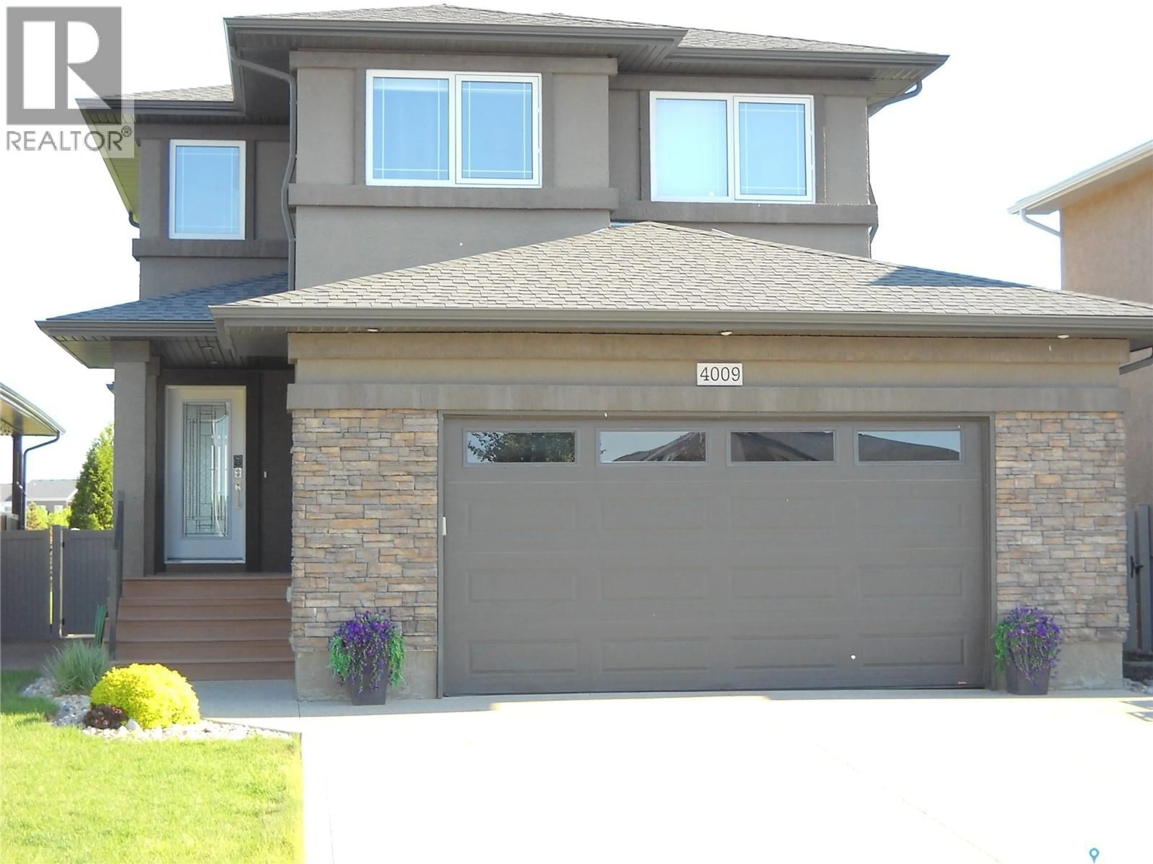 Home with vinyl exterior material, street for 4009 ALTON CRESCENT, Regina Saskatchewan S4W0H6