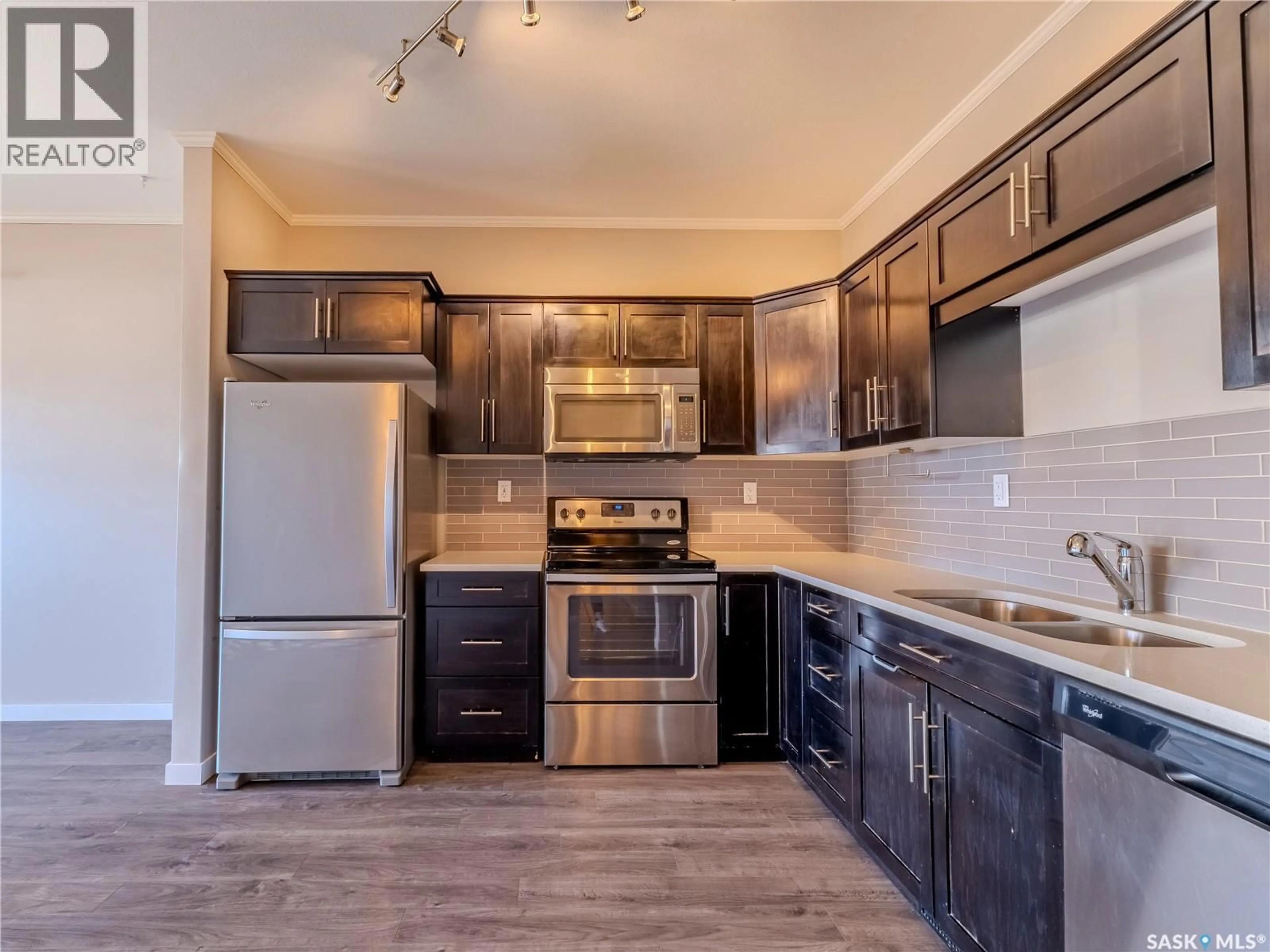 Open concept kitchen, unknown for 102 - 720 BALTZAN BOULEVARD, Saskatoon Saskatchewan S7W0W6