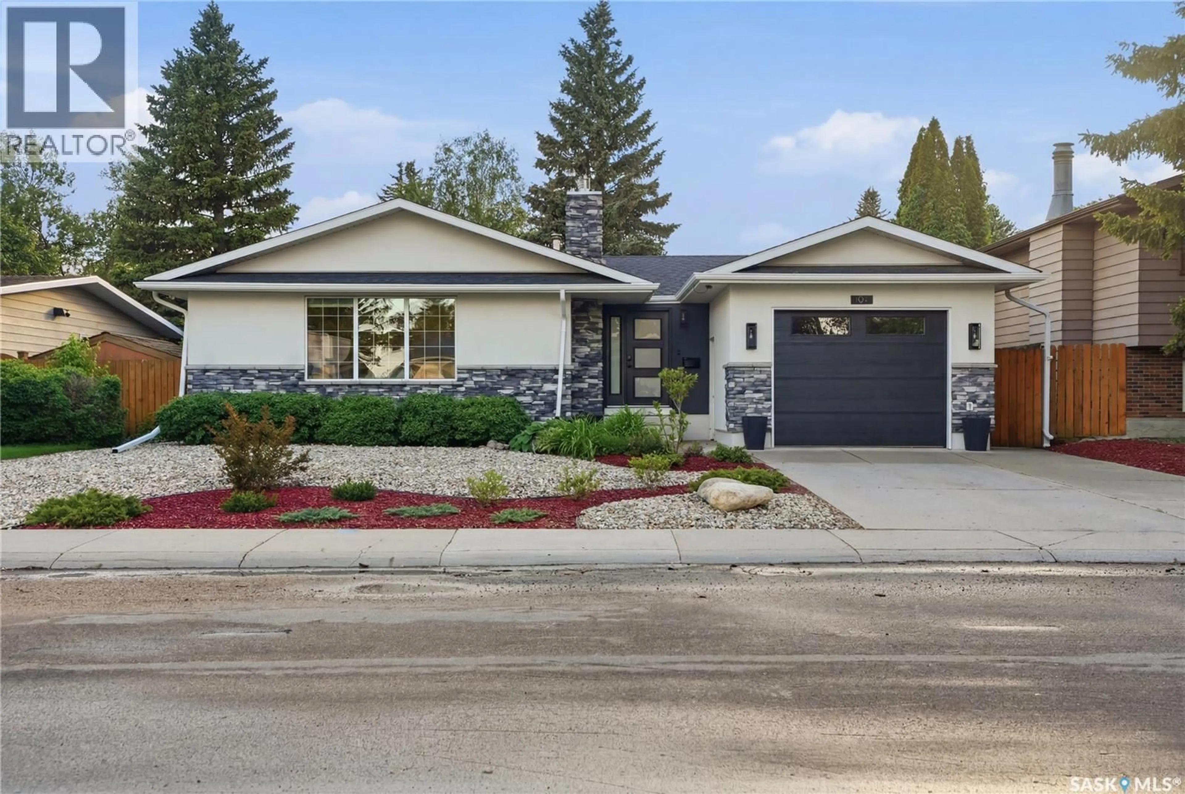 Home with vinyl exterior material, street for 105 STURGEON DRIVE, Saskatoon Saskatchewan S7K4C3