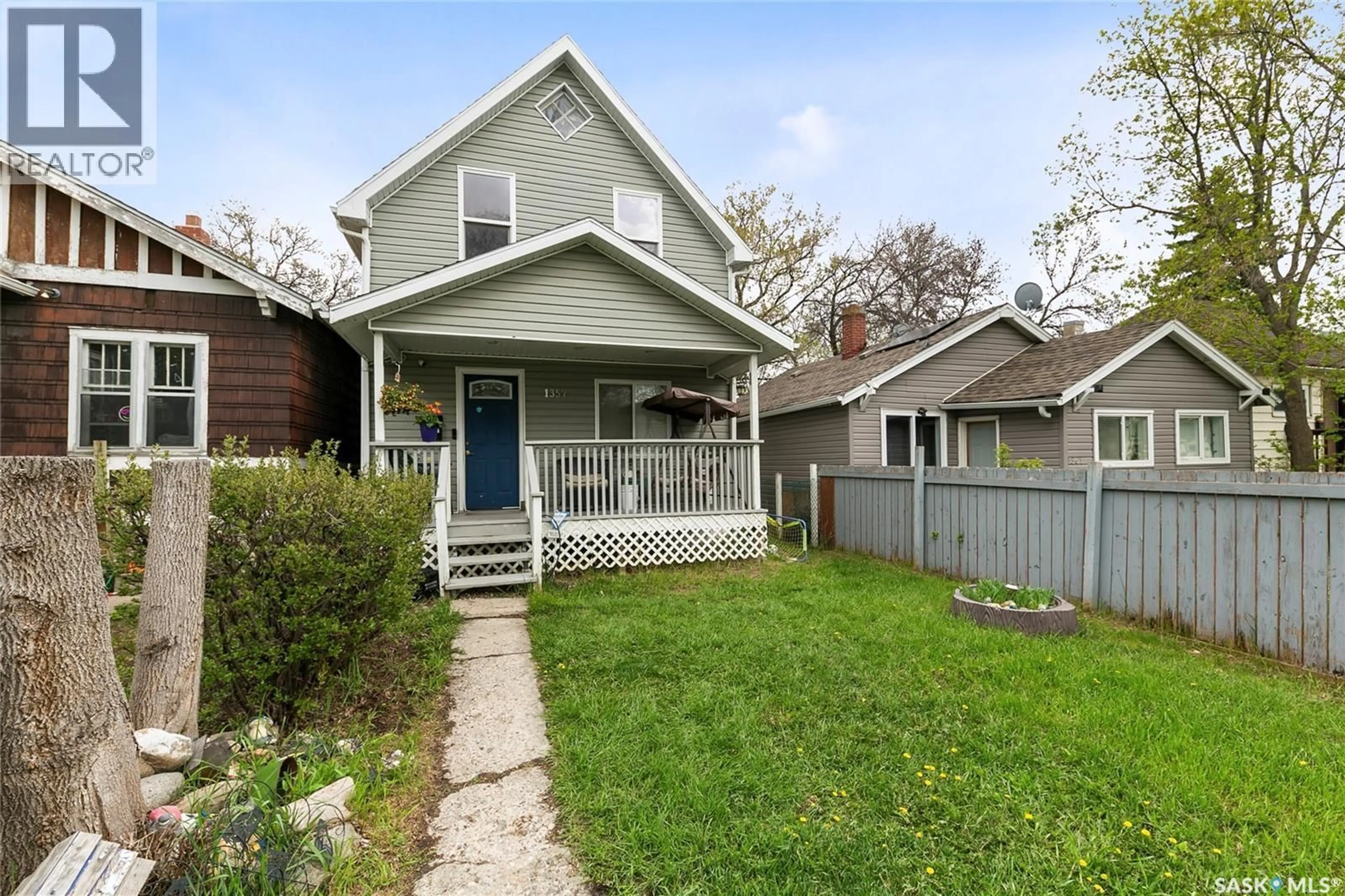Home with vinyl exterior material, street for 1357 WASCANA STREET, Regina Saskatchewan S4T4J4