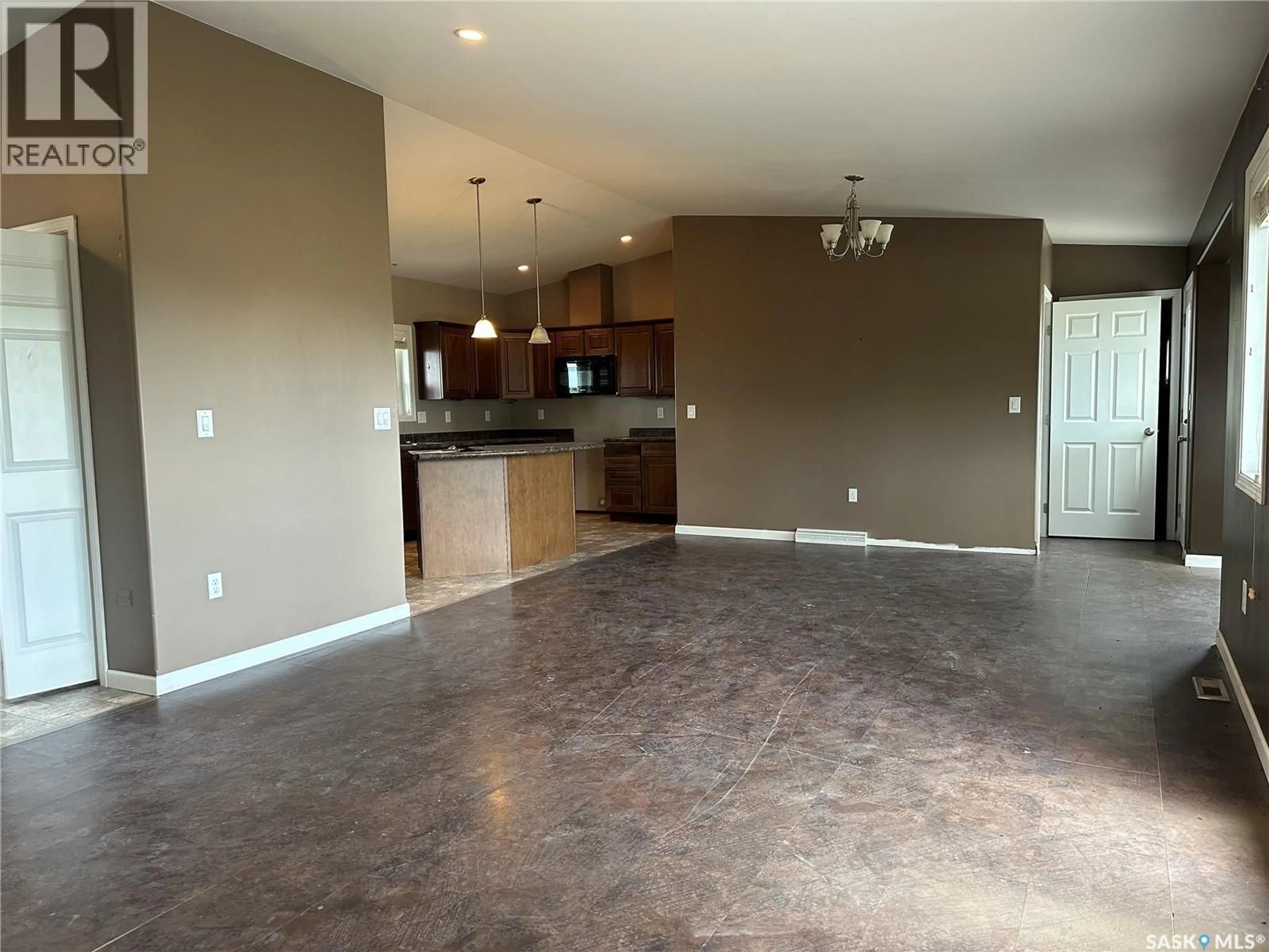 Open concept kitchen, cement floor for 201 1ST STREET, Lomond Rm No. 37 Saskatchewan S0C0V0