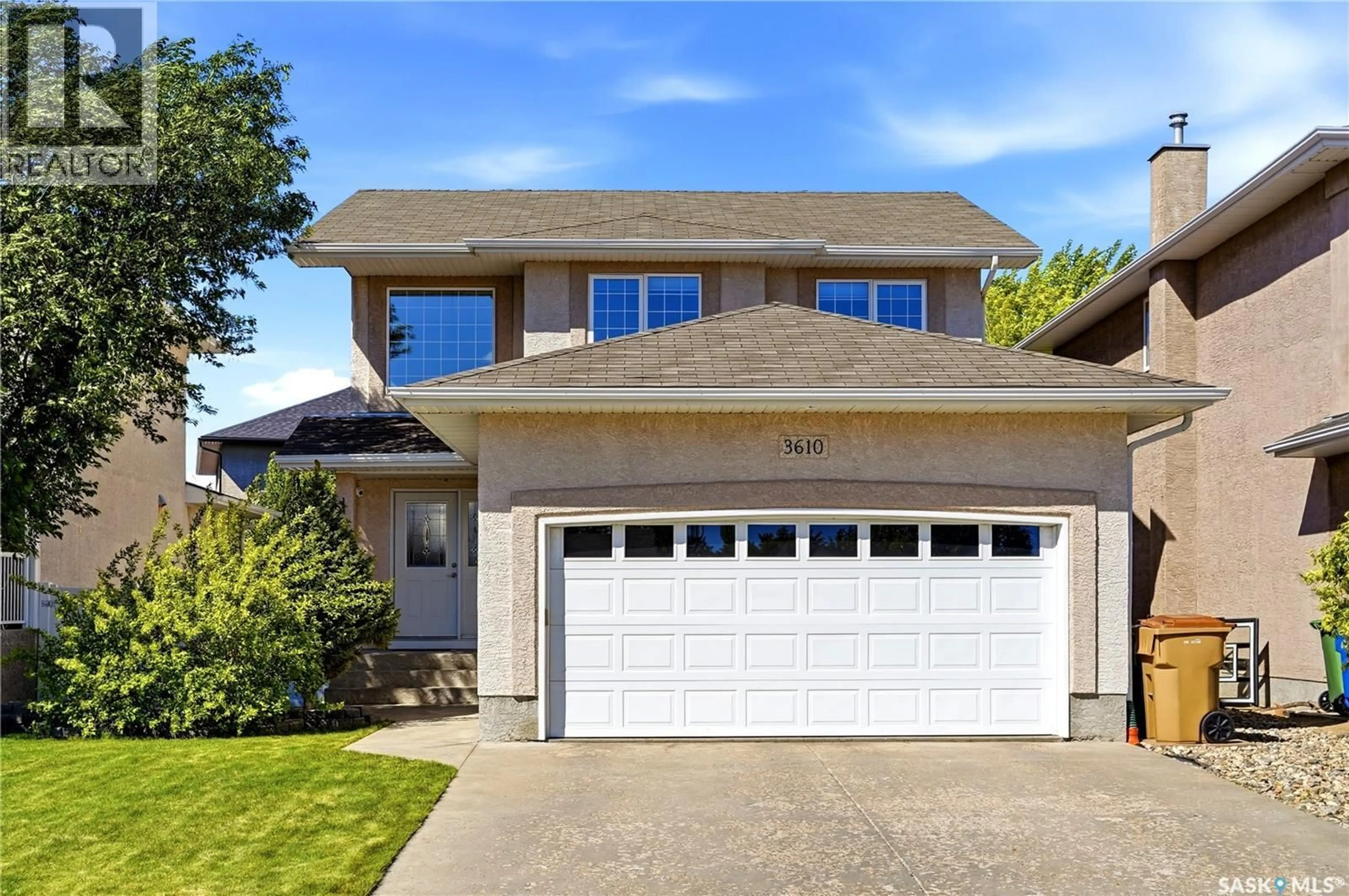 Home with vinyl exterior material, street for E - 3610 SANDRINGHAM ROAD, Regina Saskatchewan S4V3C4