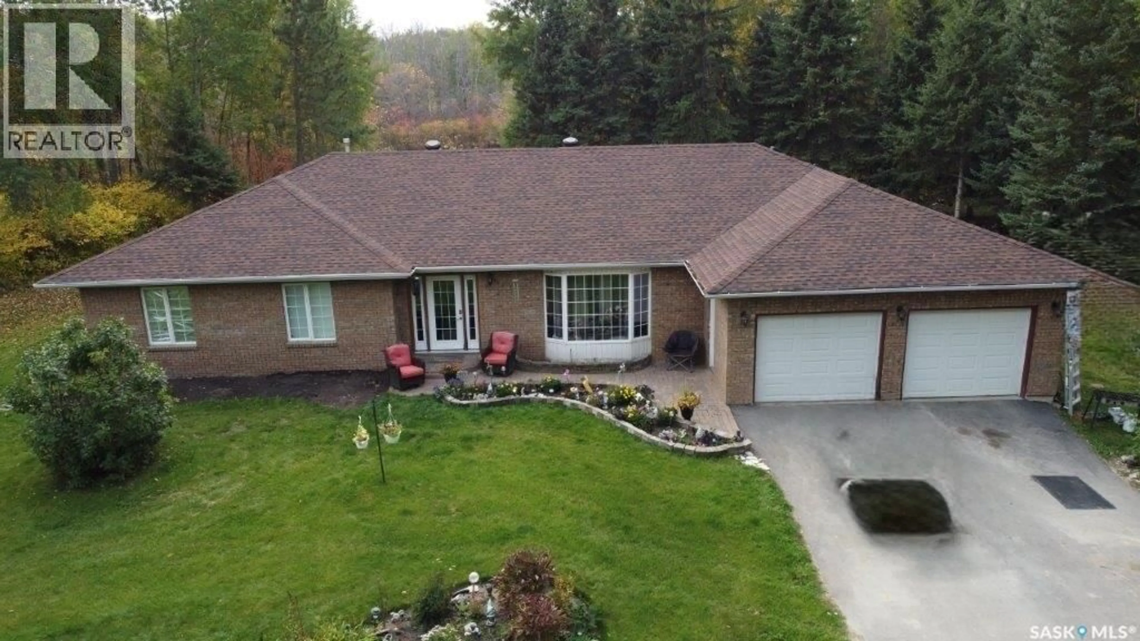 A pic from outside/outdoor area/front of a property/back of a property/a pic from drone, mountain view for 4.11 WIZEWOOD ROAD, Hudson Bay Rm No. 394 Saskatchewan S0E0Y0