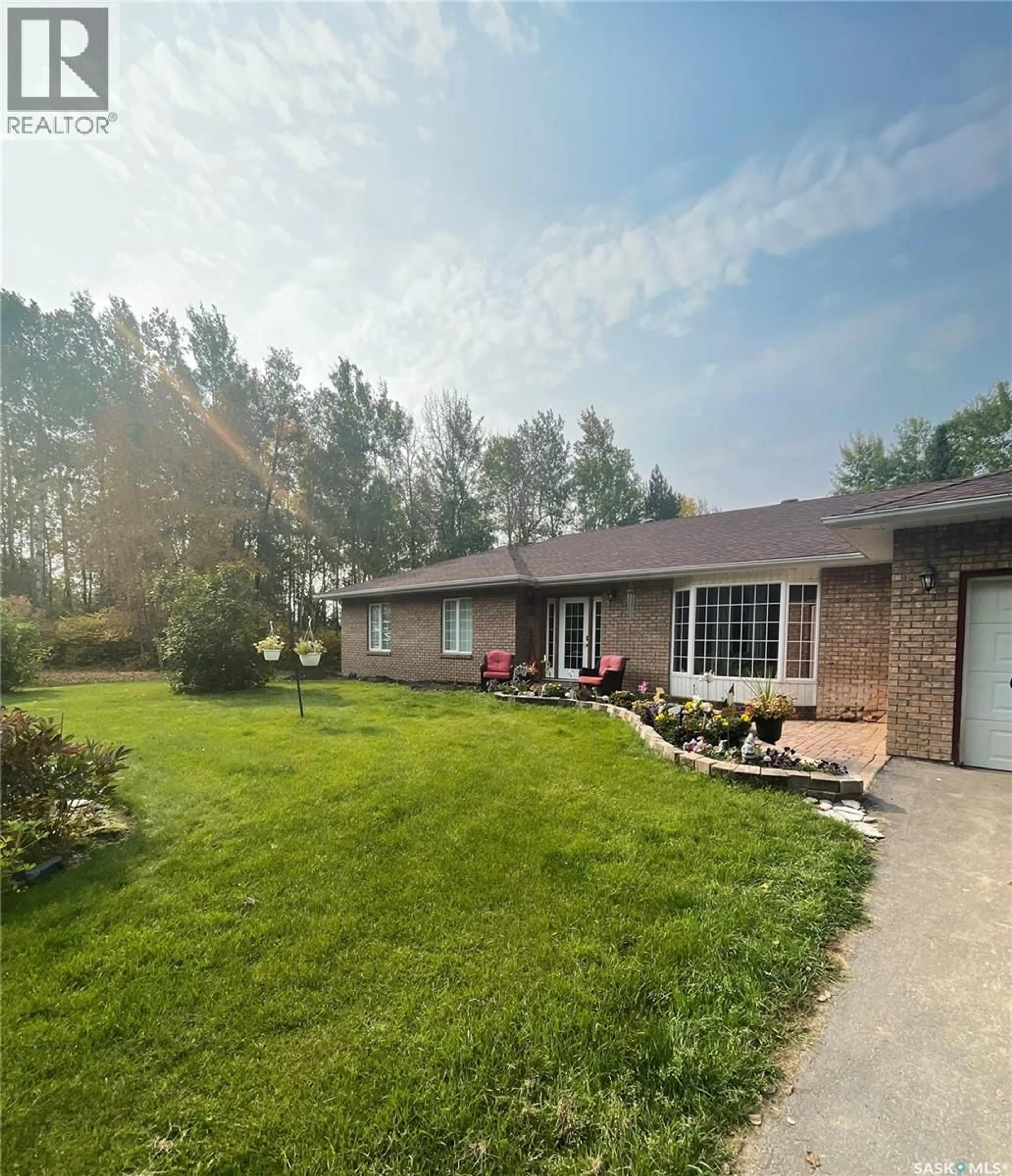 A pic from outside/outdoor area/front of a property/back of a property/a pic from drone, water/lake/river/ocean view for 4.11 WIZEWOOD ROAD, Hudson Bay Rm No. 394 Saskatchewan S0E0Y0