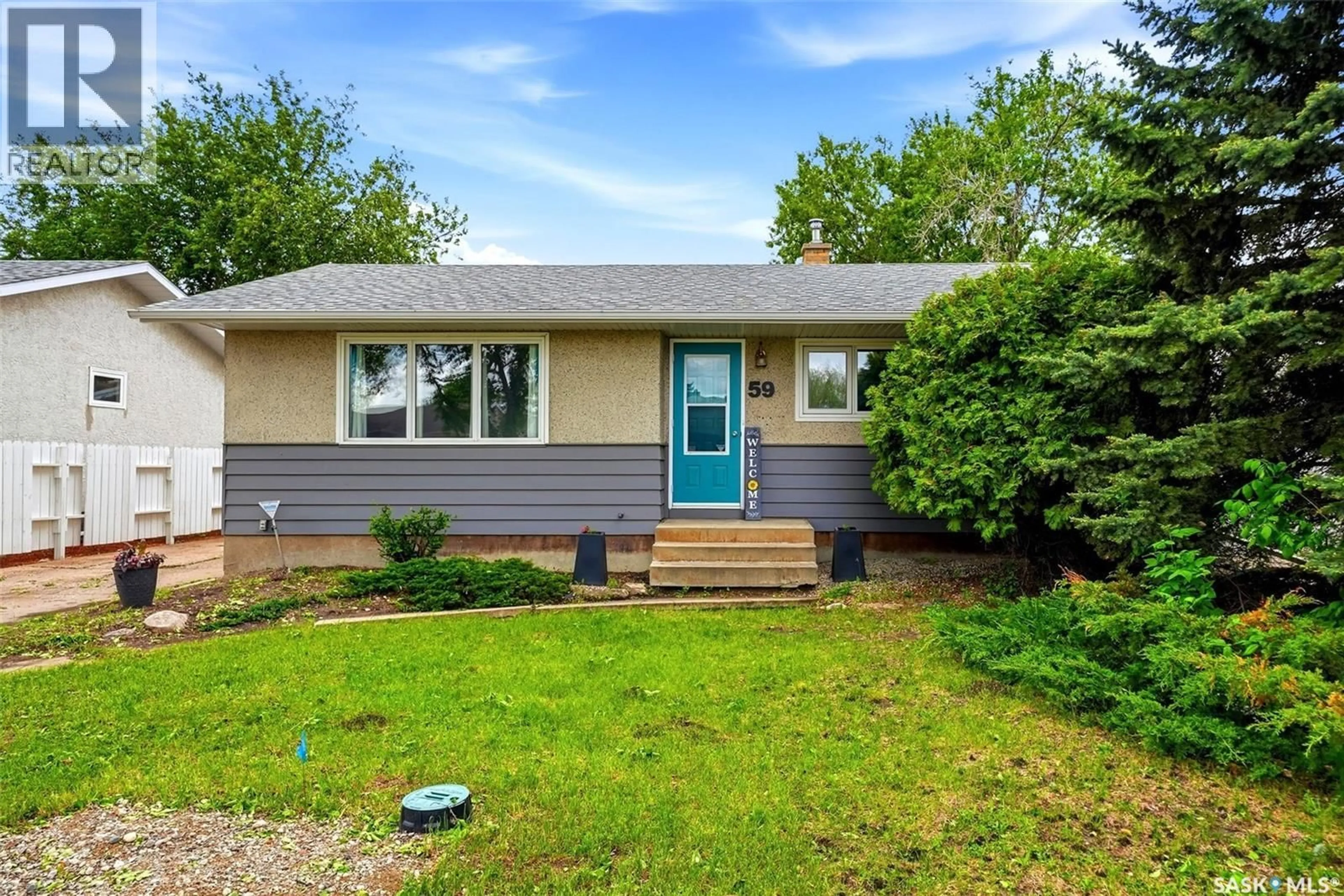 Home with vinyl exterior material, street for 59 ELMVIEW ROAD, Regina Saskatchewan S4R0B4
