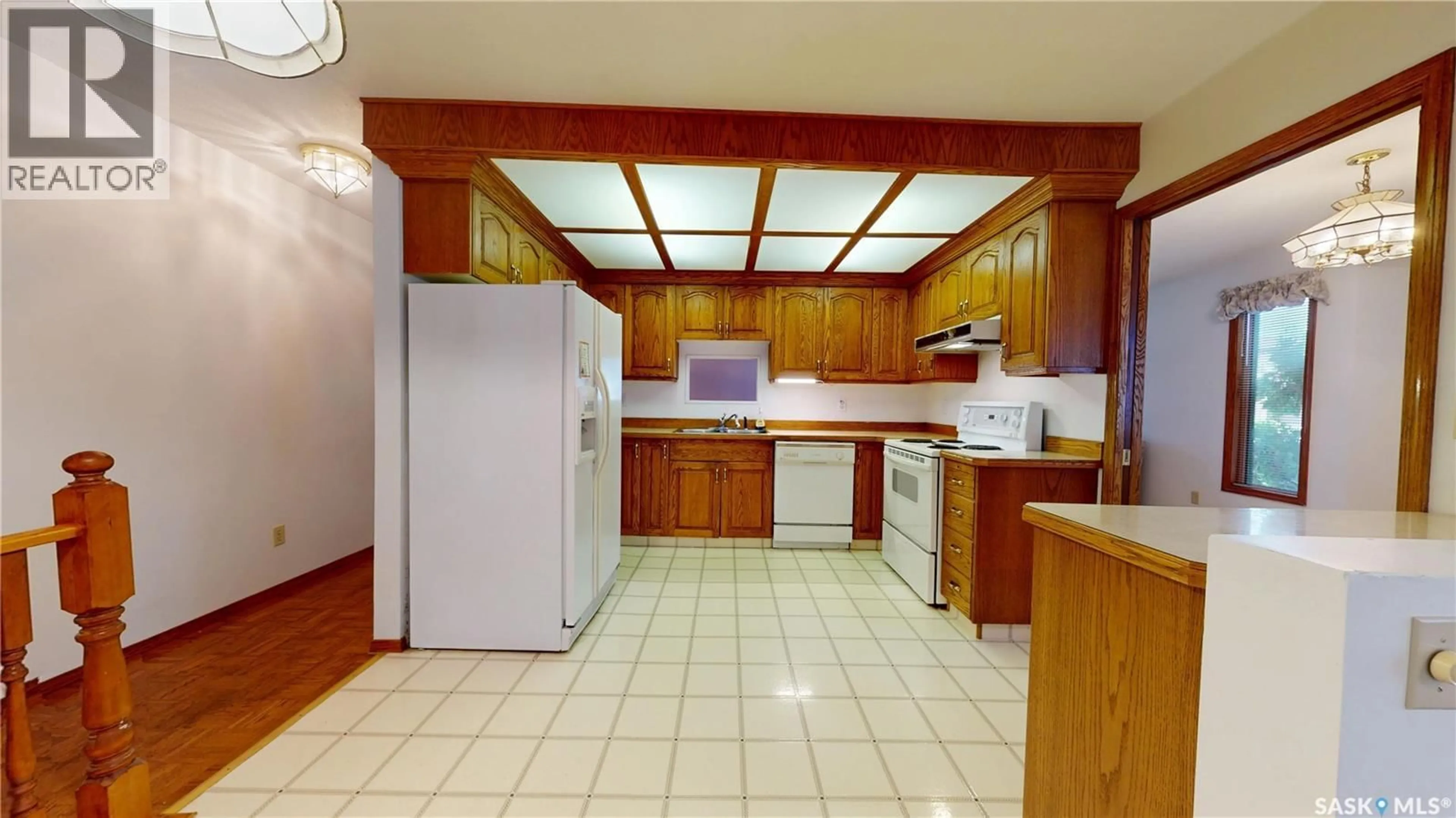 Standard kitchen, ceramic/tile floor for 302 SWAN LANE, Saskatoon Saskatchewan S7J5B5