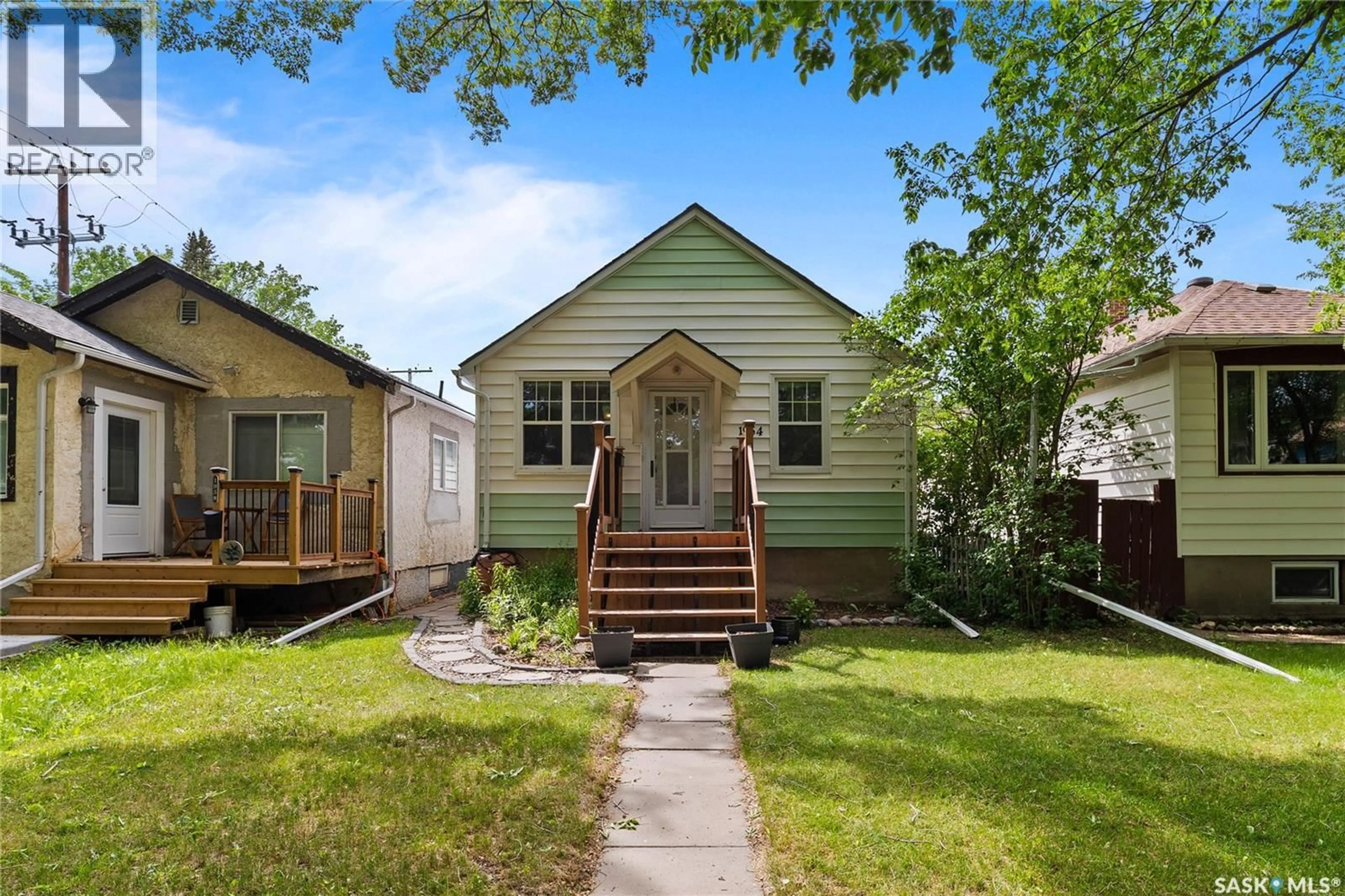 Home with vinyl exterior material, street for 1954 ATHOL STREET, Regina Saskatchewan S4T3E3
