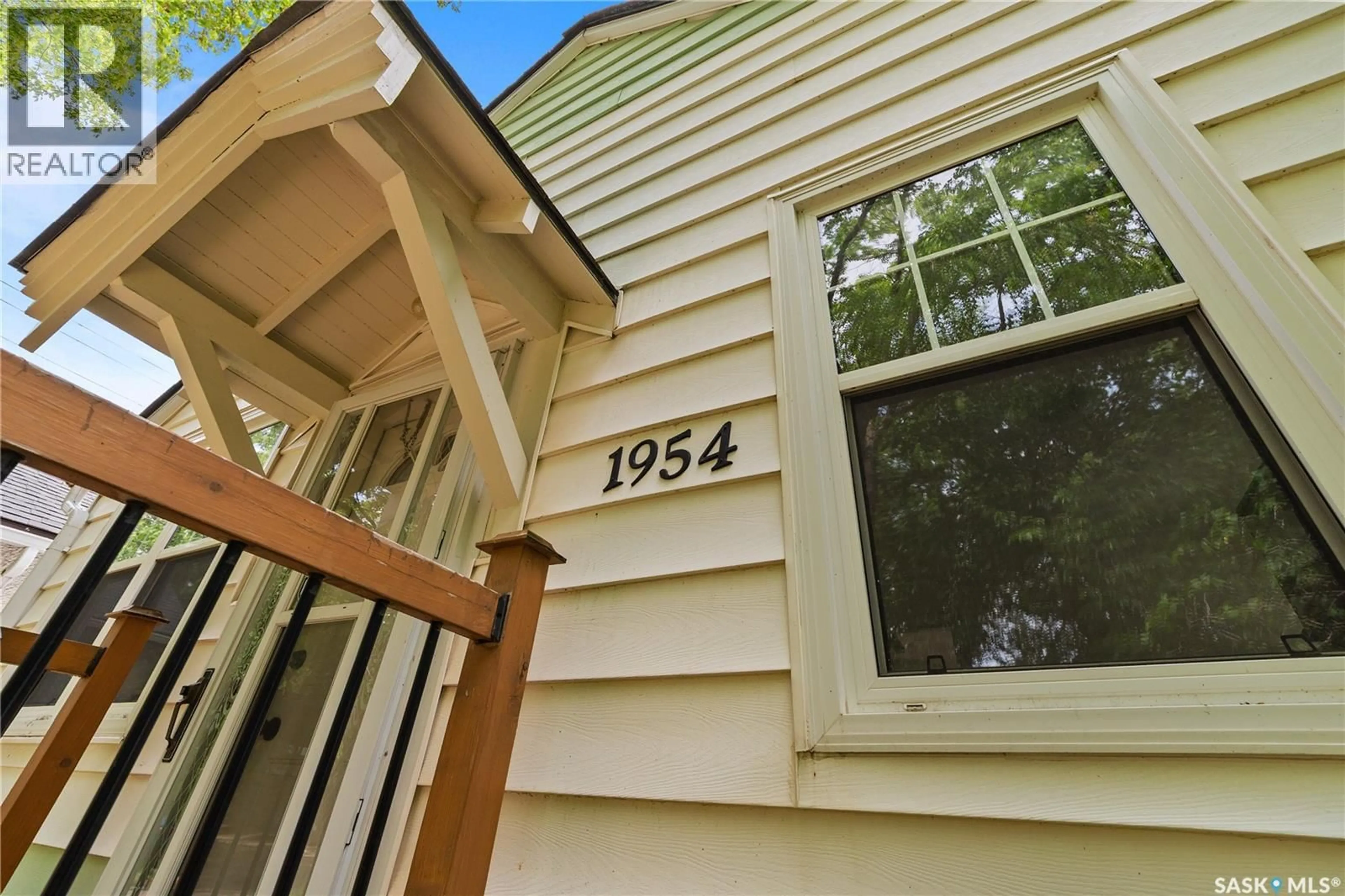 Home with vinyl exterior material, street for 1954 ATHOL STREET, Regina Saskatchewan S4T3E3
