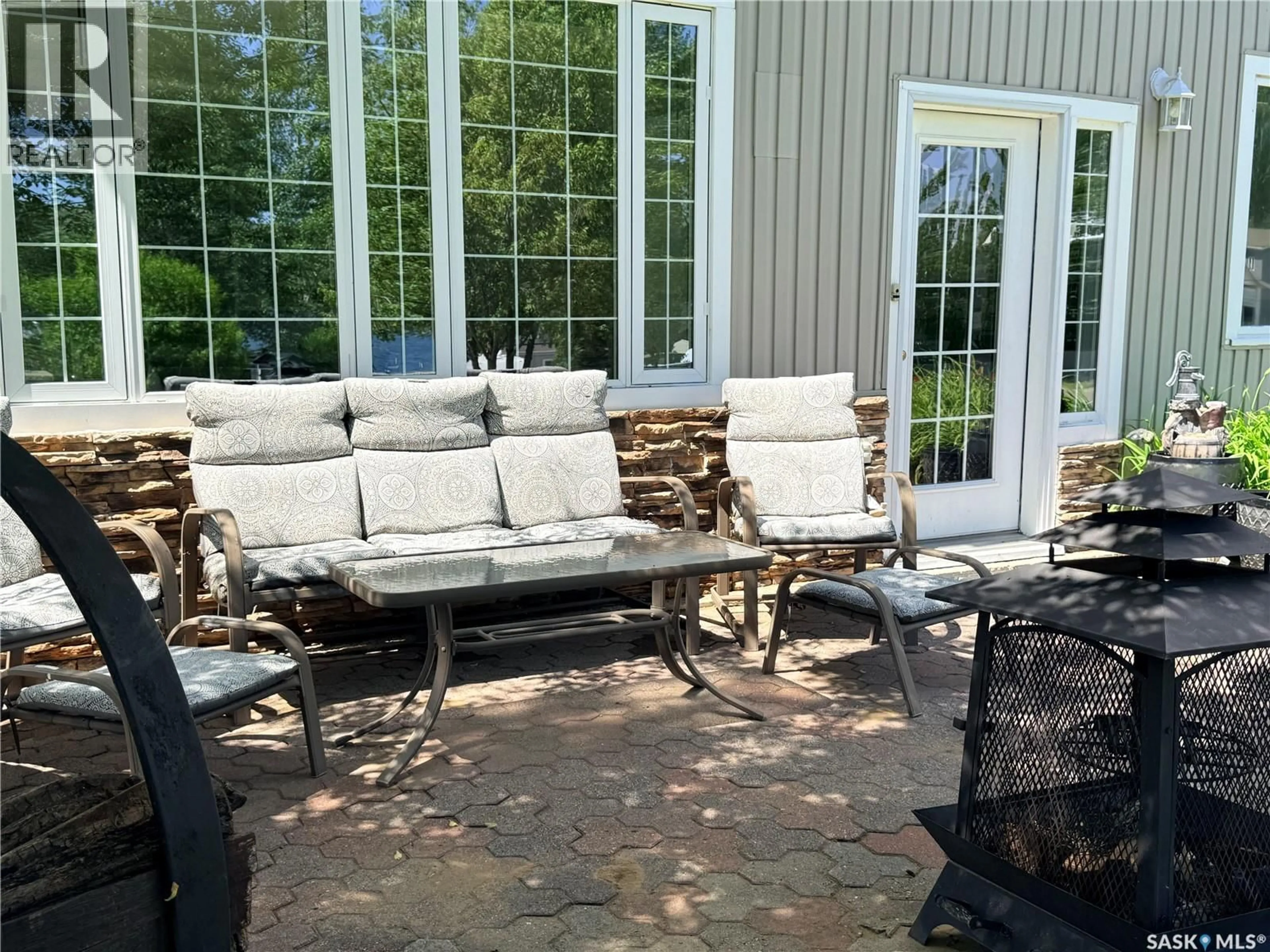 Patio, water/lake/river/ocean view for 211 WALL RIDGE TRAIL, Lac Pelletier Rm No. 107 Saskatchewan S0N2Y0