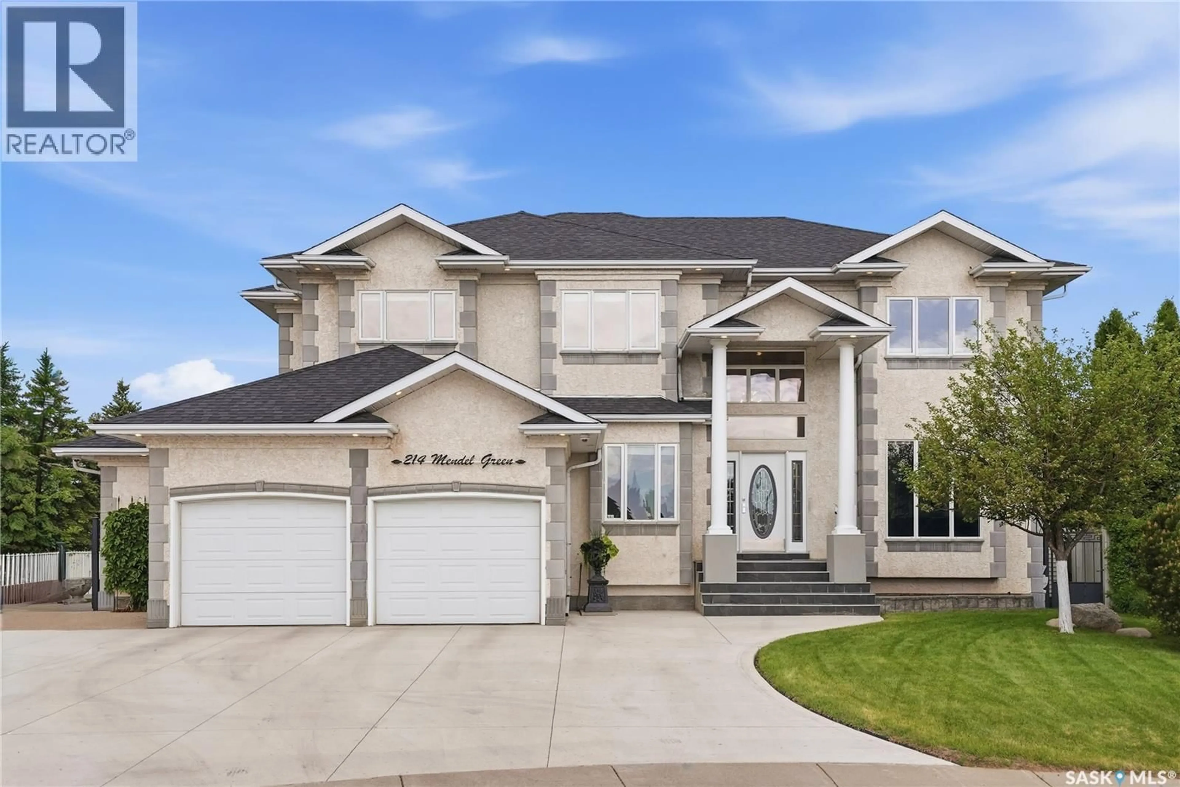 Home with vinyl exterior material, street for 214 MENDEL GREEN, Saskatoon Saskatchewan S7J5J7