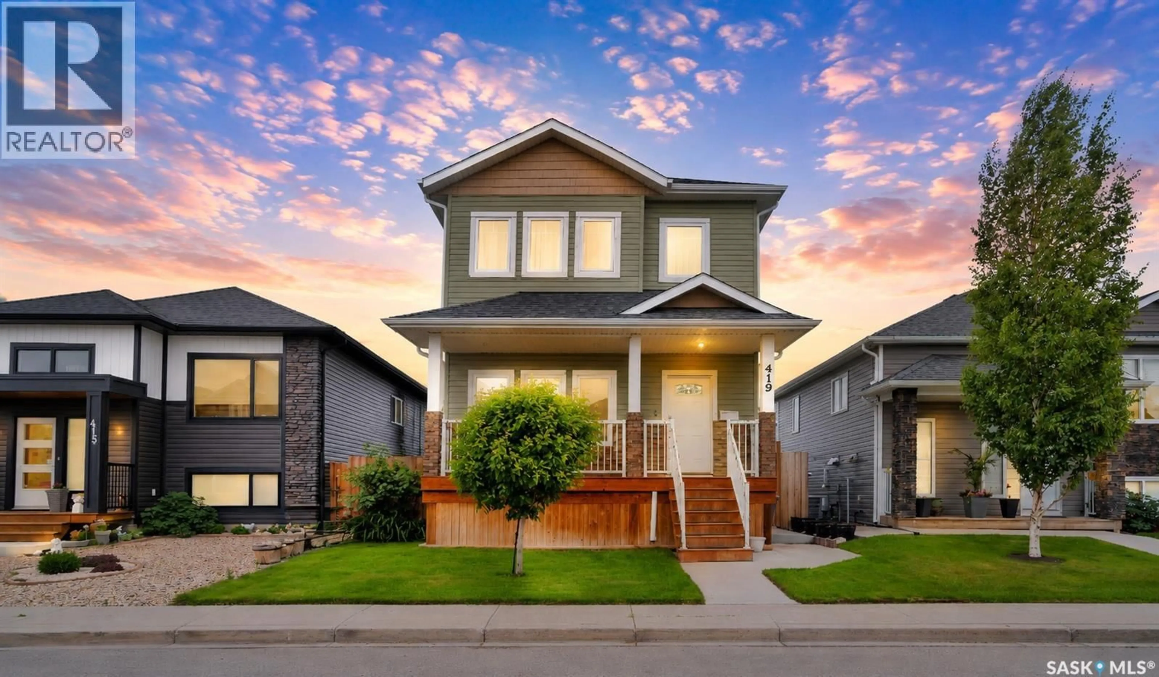 Home with vinyl exterior material, street for 419 ELLS WAY, Saskatoon Saskatchewan S7L6K8